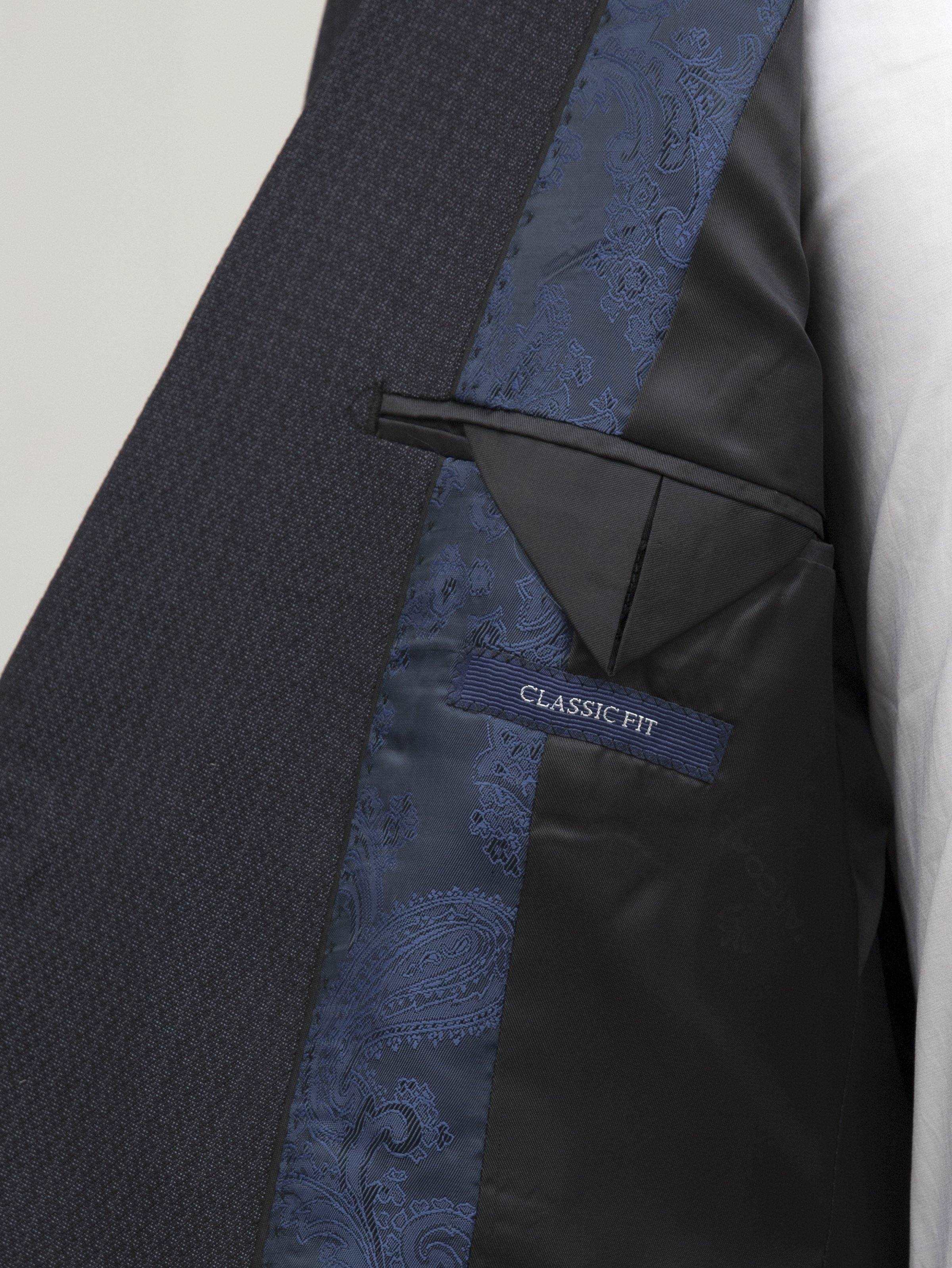 Suit jacket interior with patterned lining and "CLASSIC FIT" label