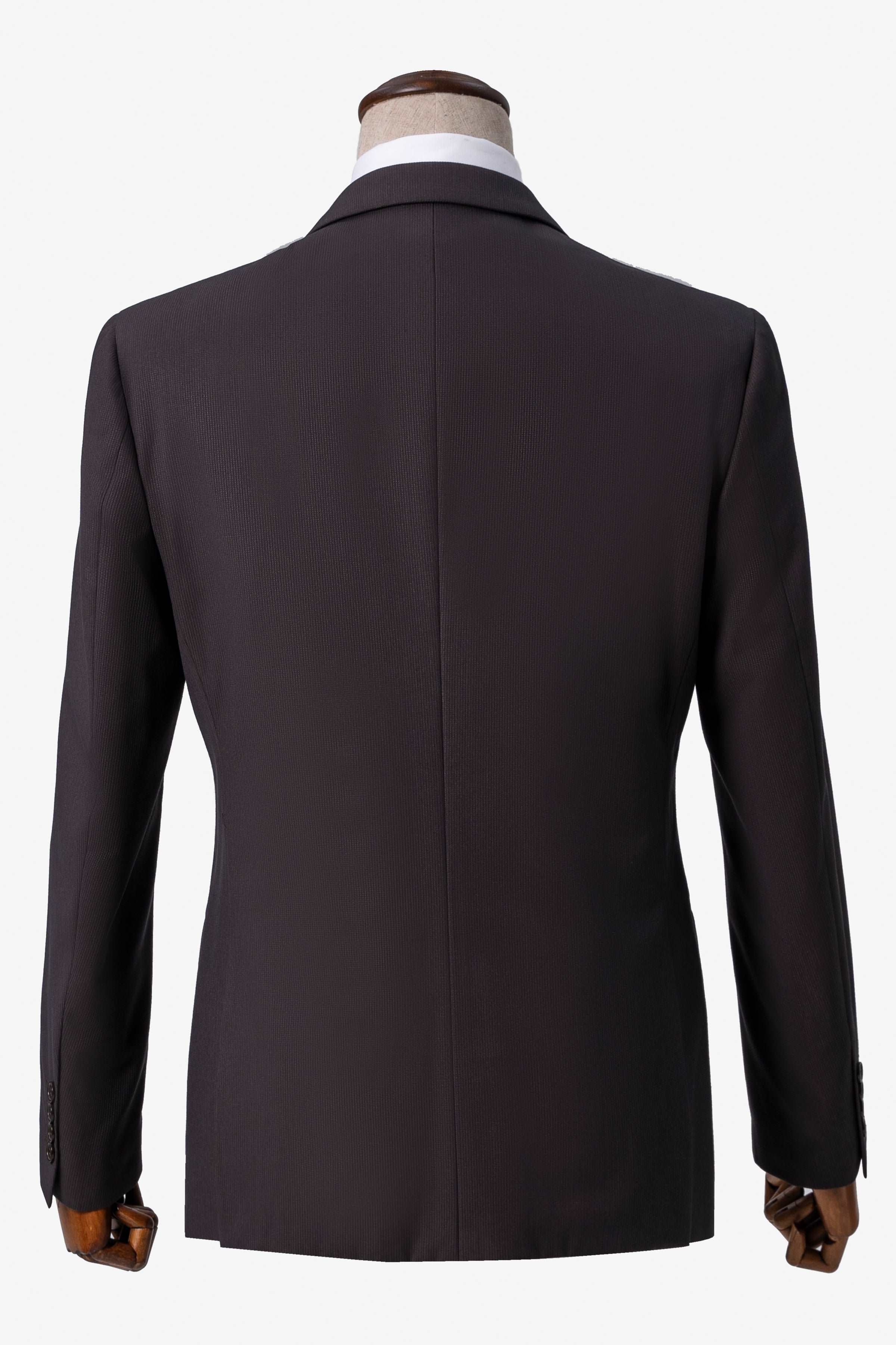 Brown suit jacket back view with center seam and buttoned cuffs