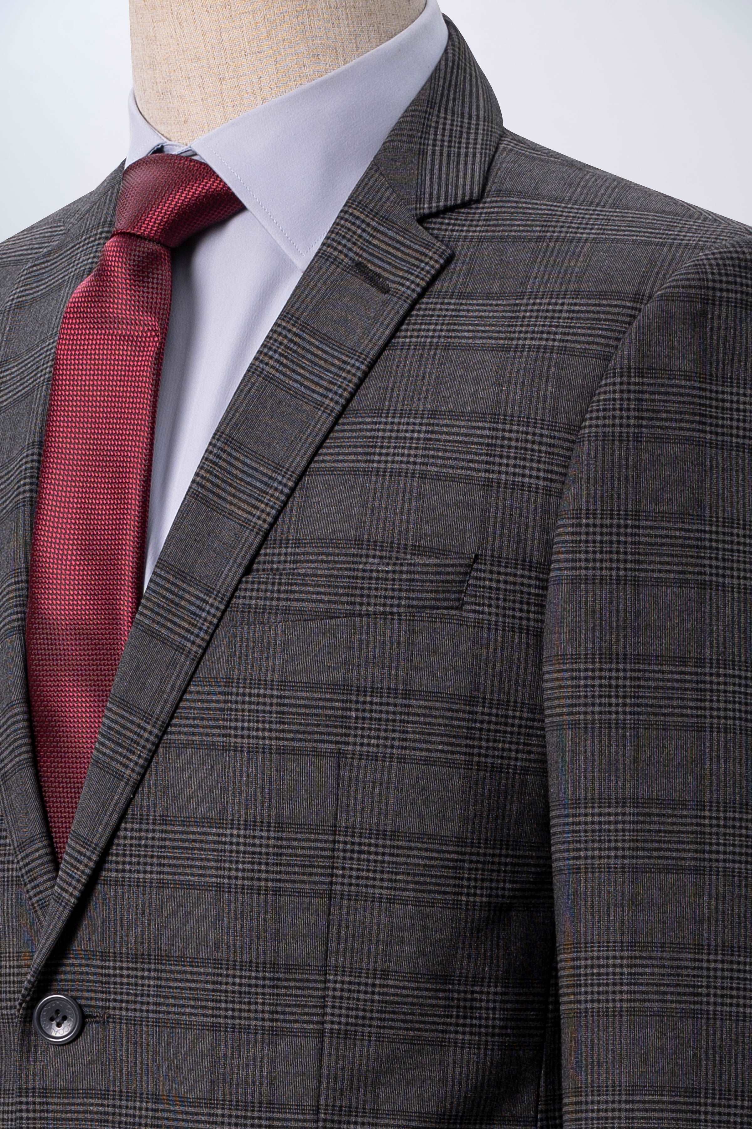 Dark grey suit jacket with plaid pattern and breast welt pocket