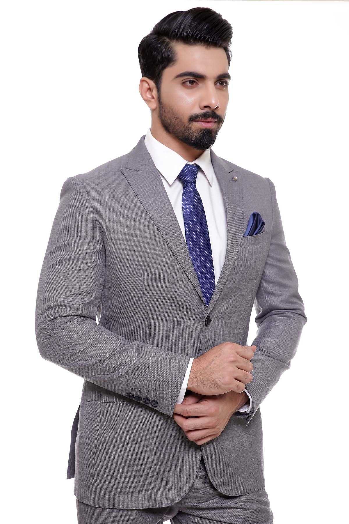 Two-piece grey suit with blue tie, white shirt, and folded pocket square
