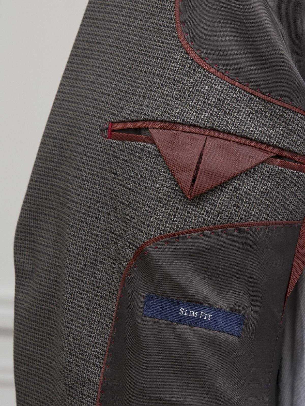 Grey two-piece suit jacket with red-trim lining and interior pocket