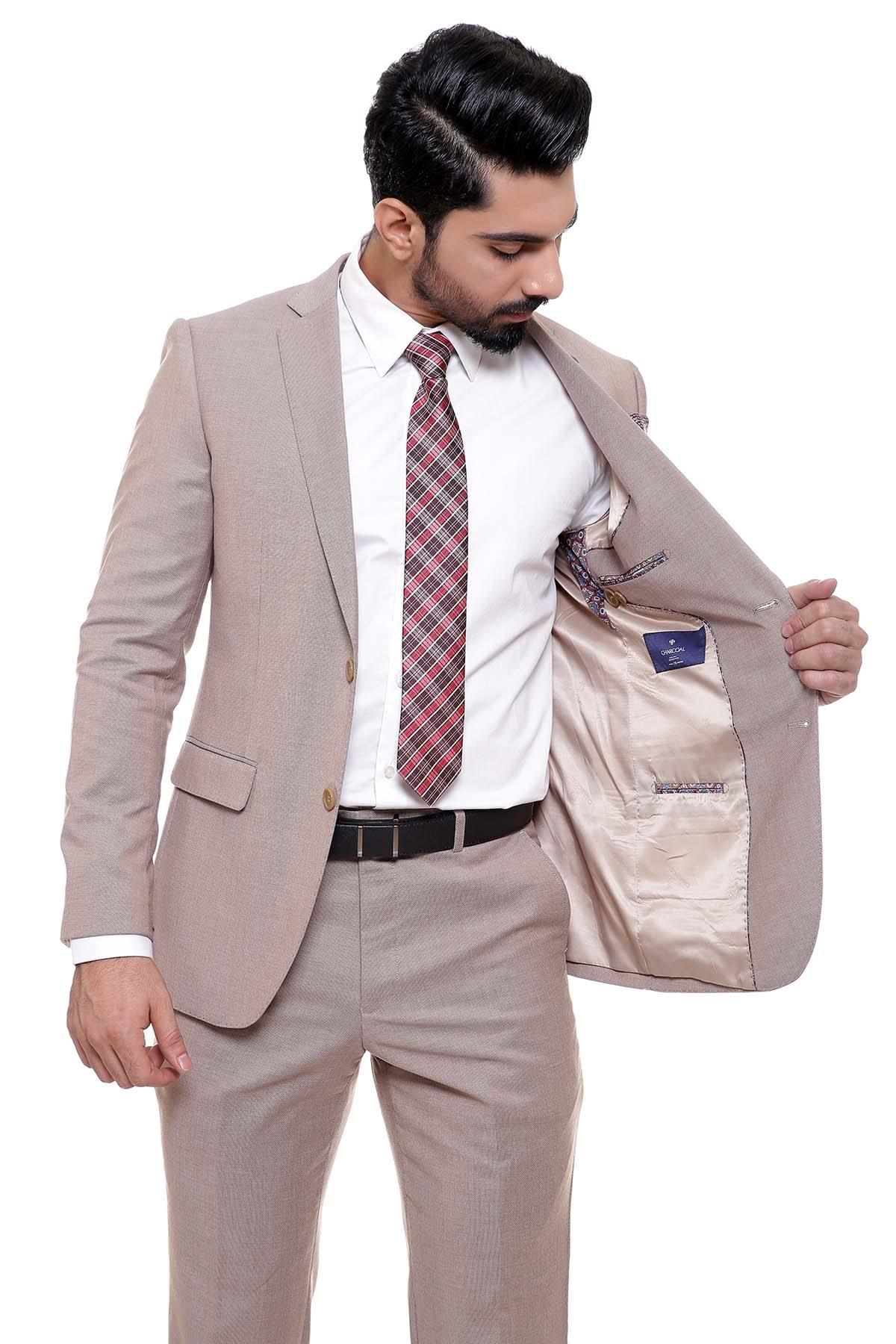 Light brown suit jacket open to reveal inner pocket lining, check tie