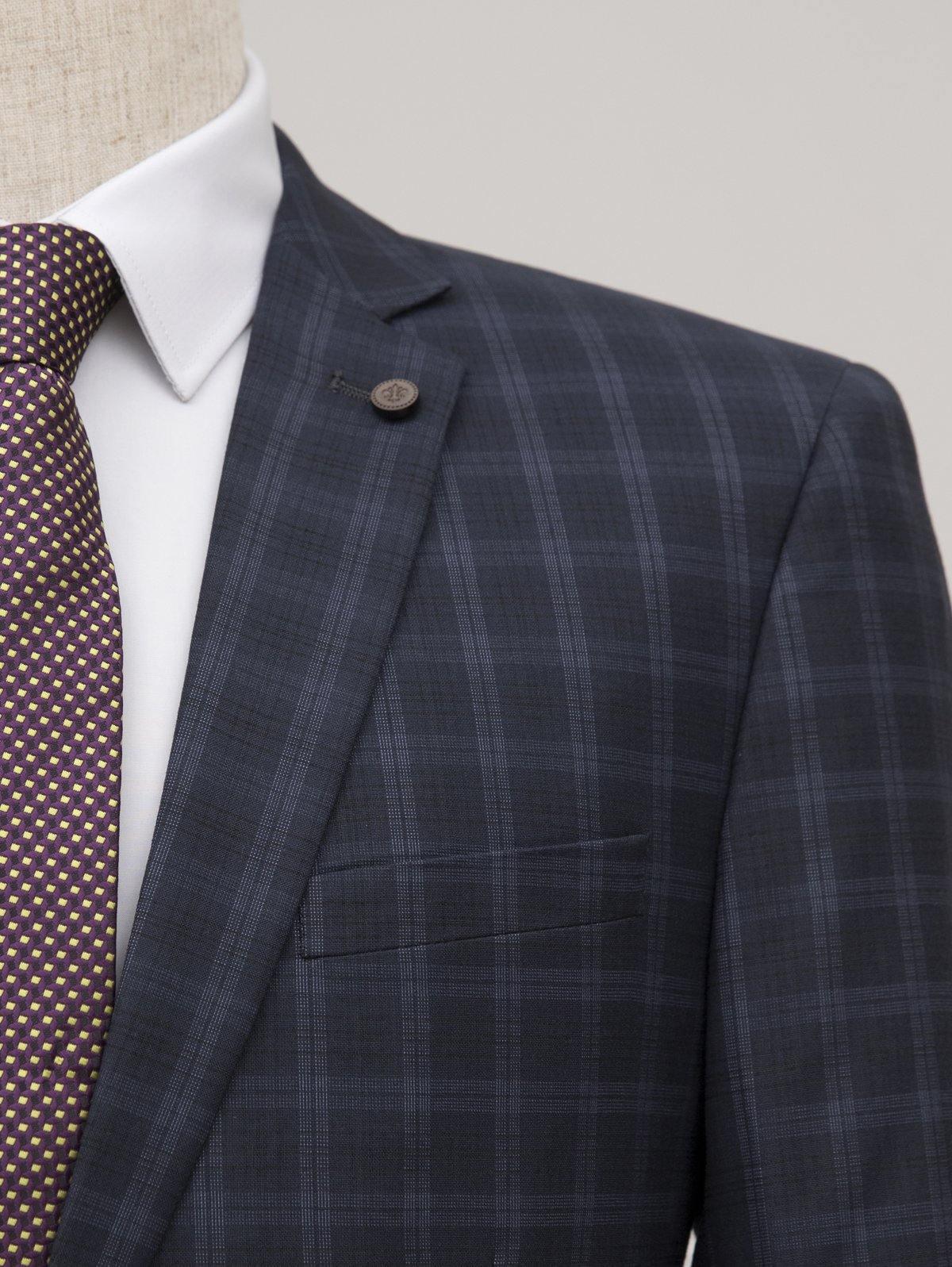 Navy plaid suit jacket with notched lapel and single button closure