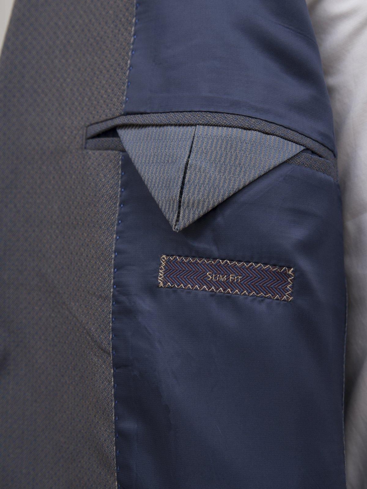 Navy suit blazer pocket label with contrast lining