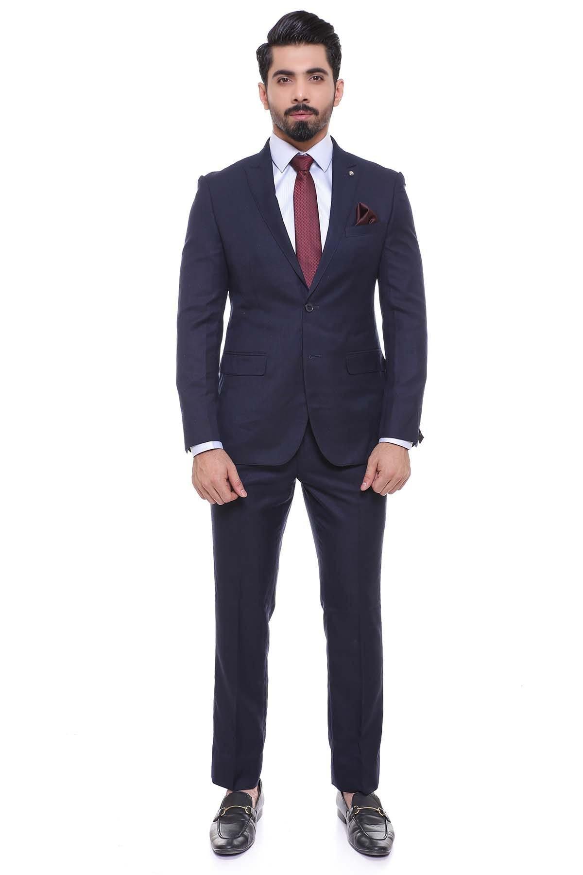 Dark navy two-piece suit: blazer and trousers with burgundy tie and pocket square.
