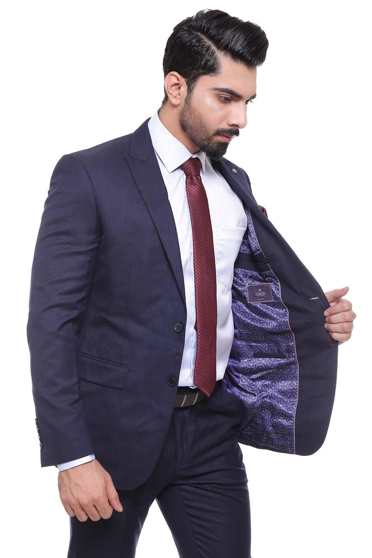 Dark navy two-piece suit with blazer and trousers, burgundy tie, visible inner lining texture.
