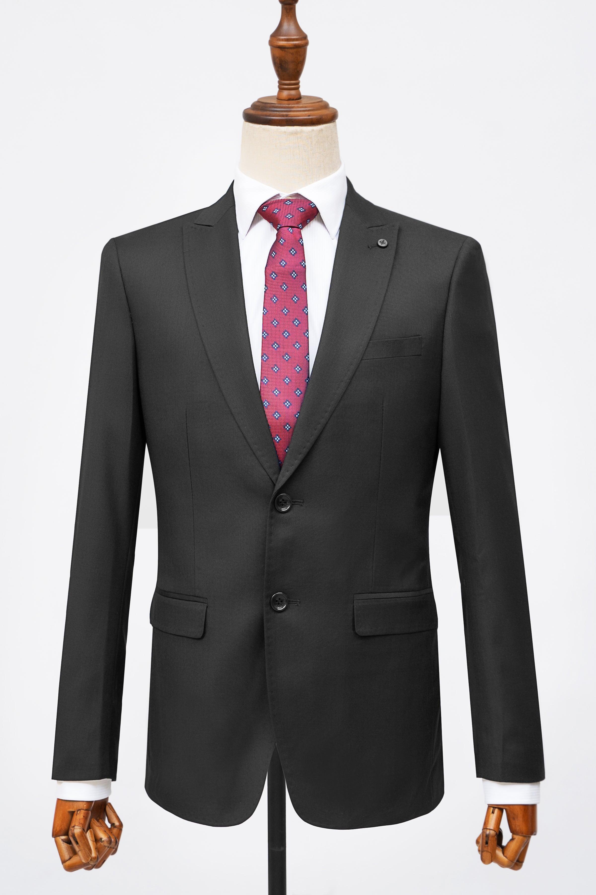 Slim-fit black two-piece suit jacket with notch lapels, flap pockets, and pink tie