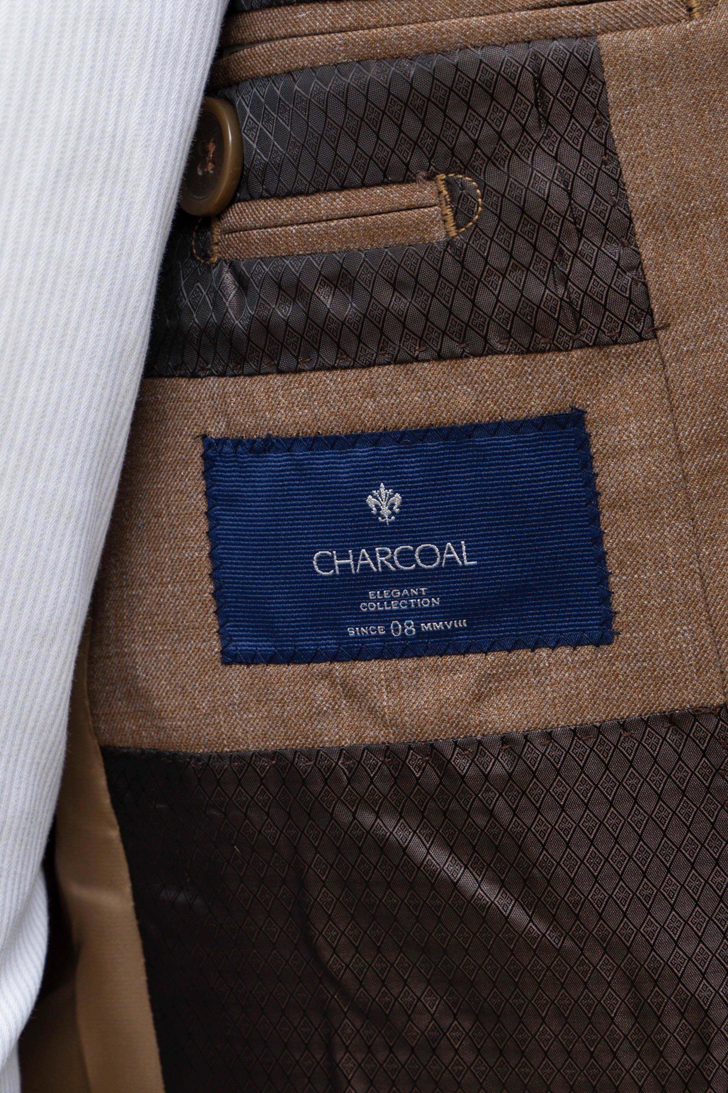 Suit jacket inner label patch reading CHARCOAL on light brown fabric