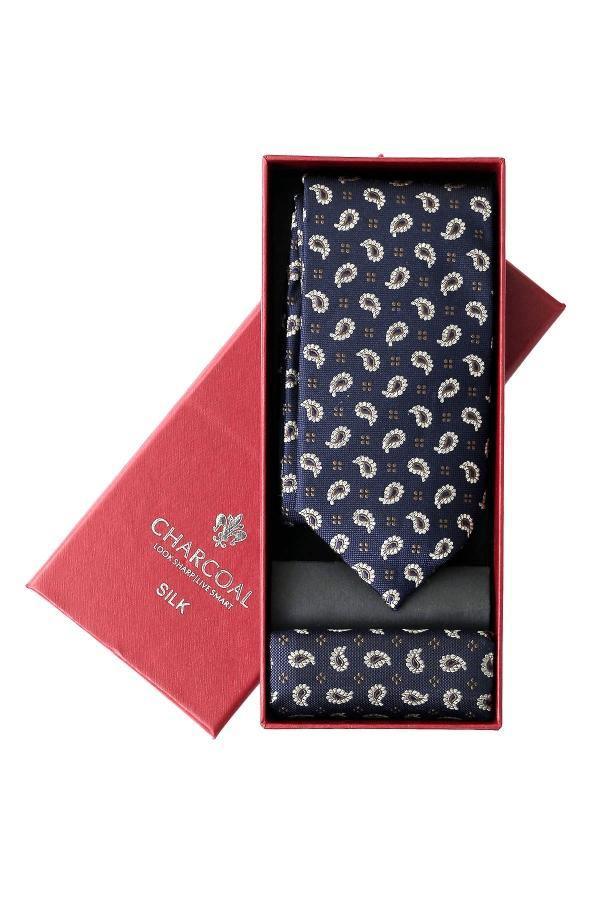 Silk tie set with navy tie featuring small white medallions, in gift box