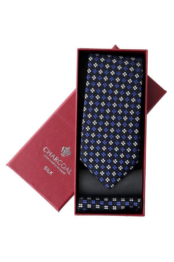 Silk tie set with navy patterned tie in gift box and matching sleeve
