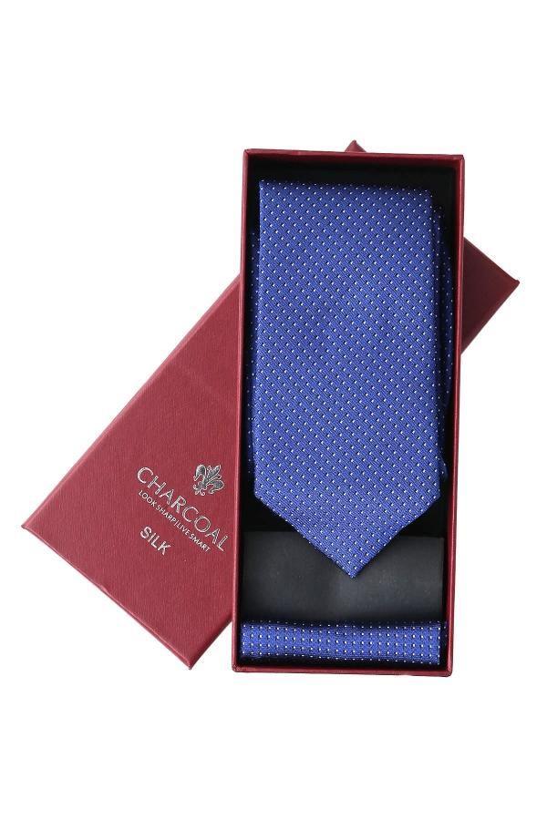 Silk tie set in gift box with blue patterned necktie and maroon silk insert