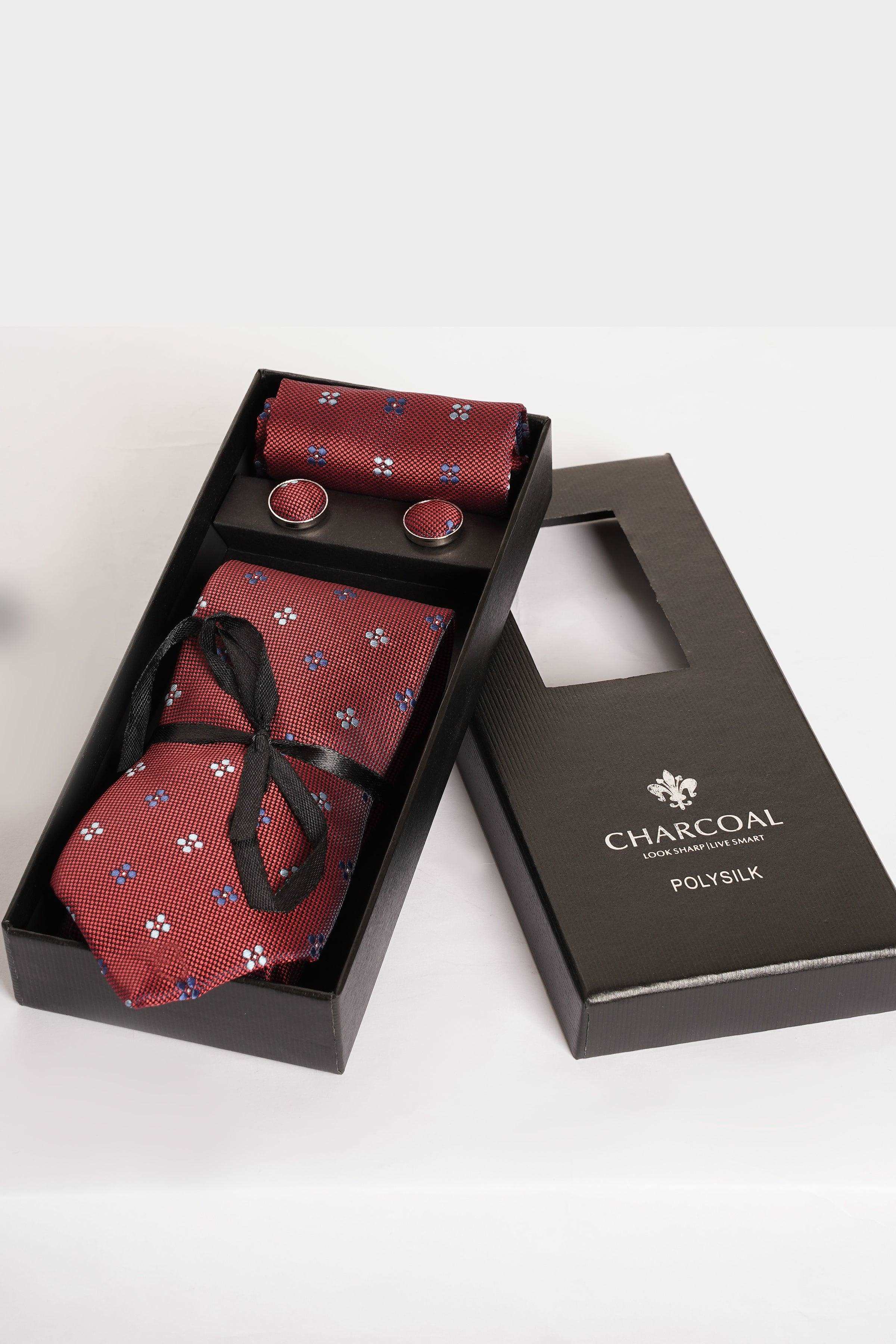 Box tie set with maroon patterned necktie, pocket square and cufflinks in gift box