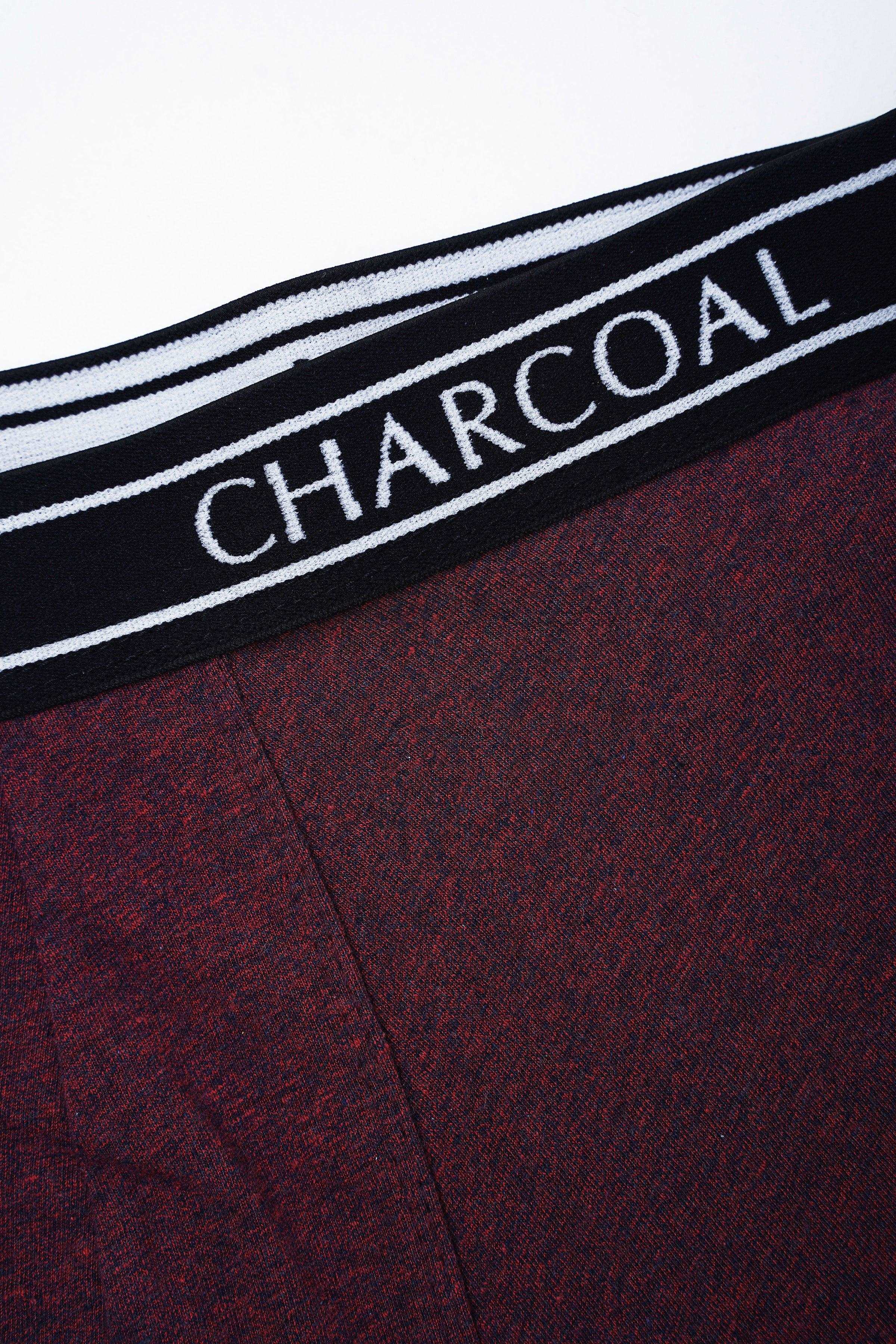 Maroon boxer shorts close-up: charcoal waistband with CHARCOAL lettering.