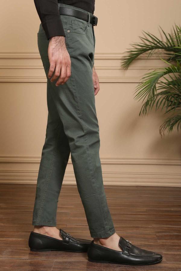 Olive slim-fit 5-pocket pants on model, full length view