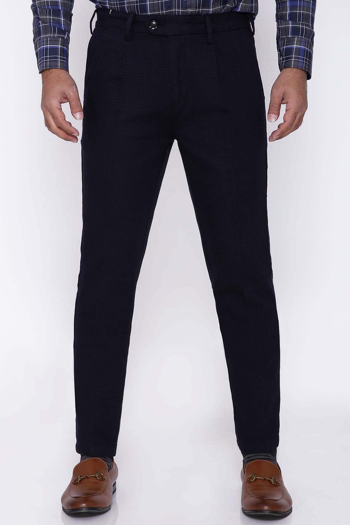Navy dress pants with front slant pockets and button waist, slim fit