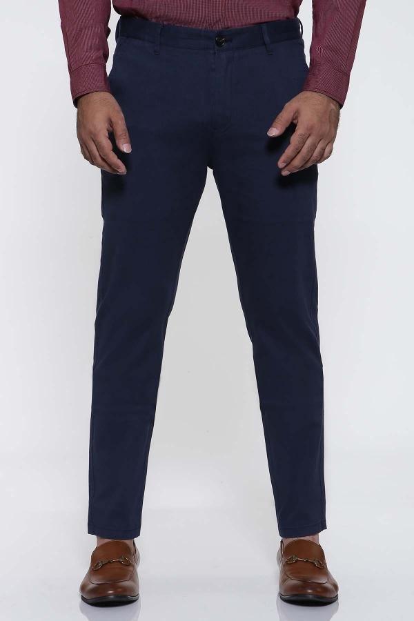 Slim-fit navy trousers with front slant pockets and tapered legs