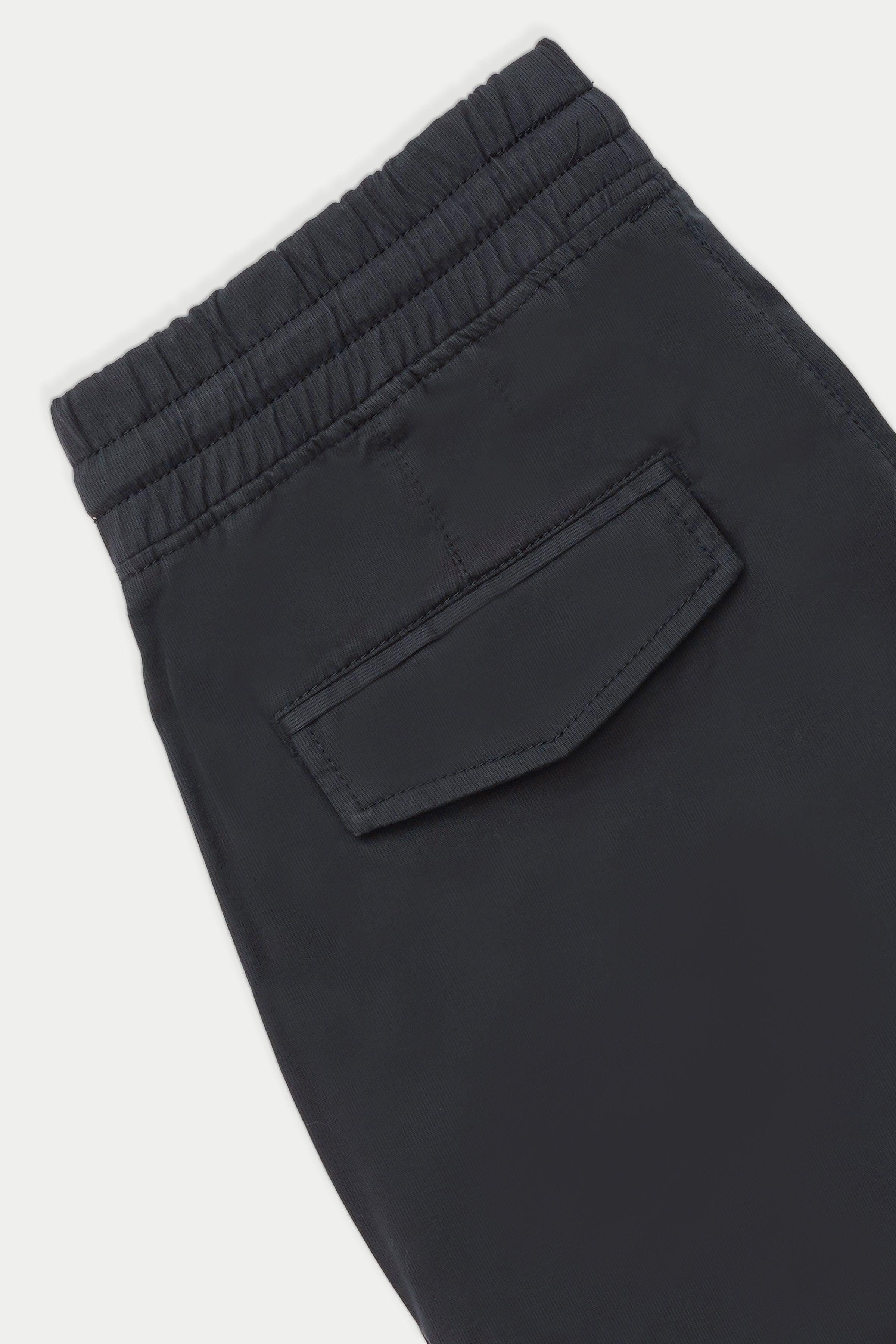 Navy cargo trousers with elastic waist and flap cargo pocket