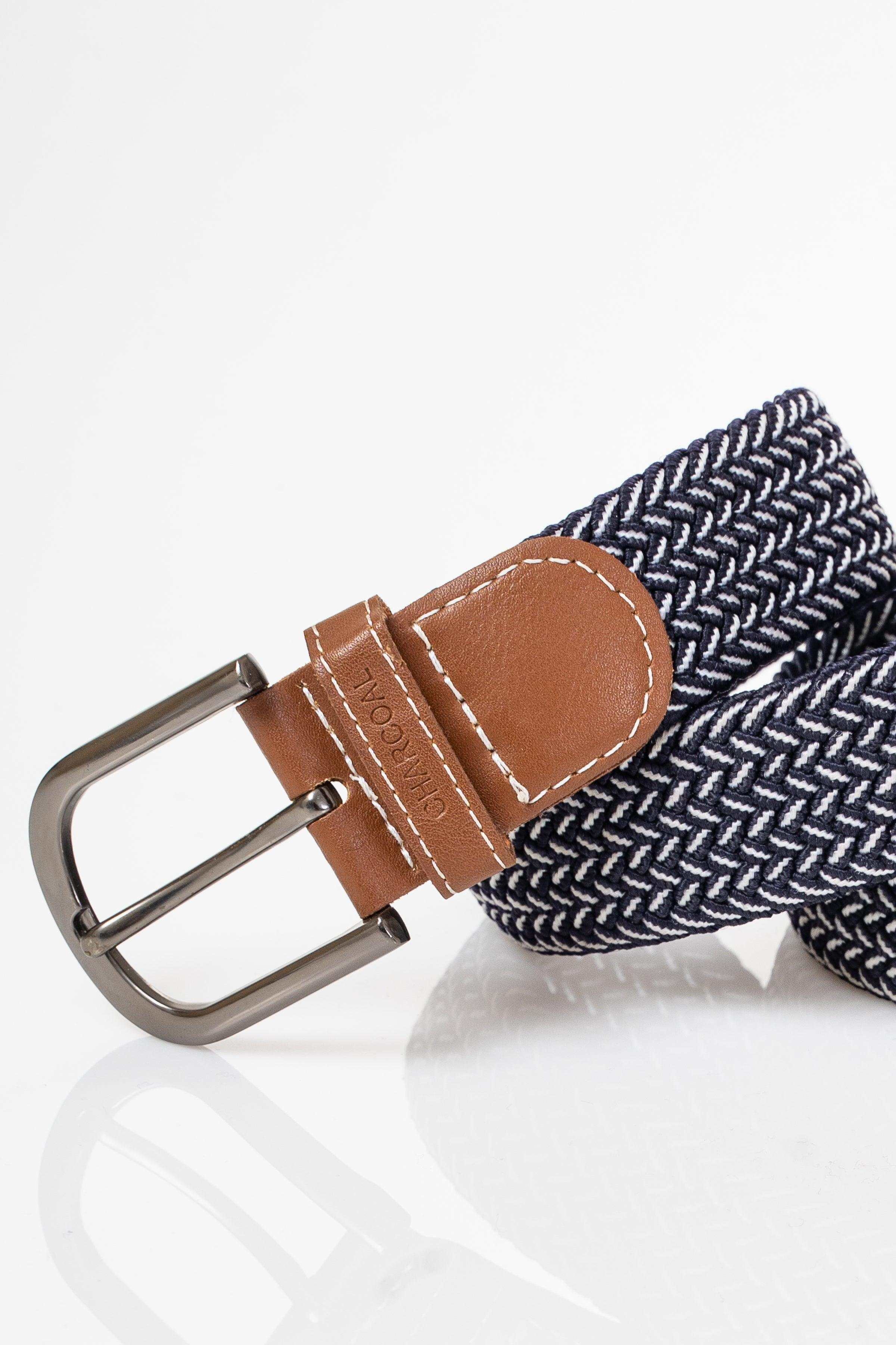 Braided navy belt close-up showing brown leather keeper and silver buckle