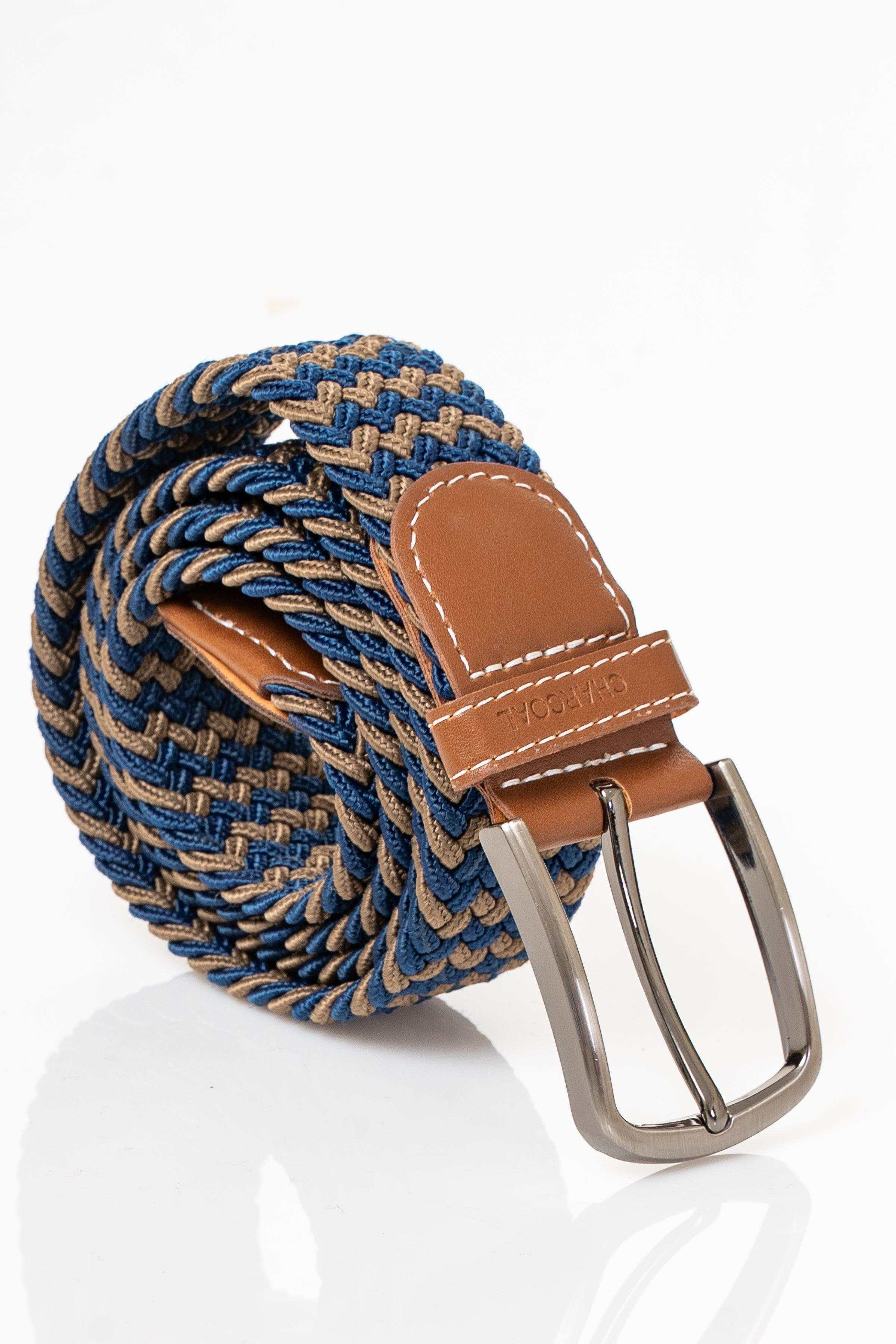 Casual belt rolled up: blue woven texture with tan leather patch and silver buckle