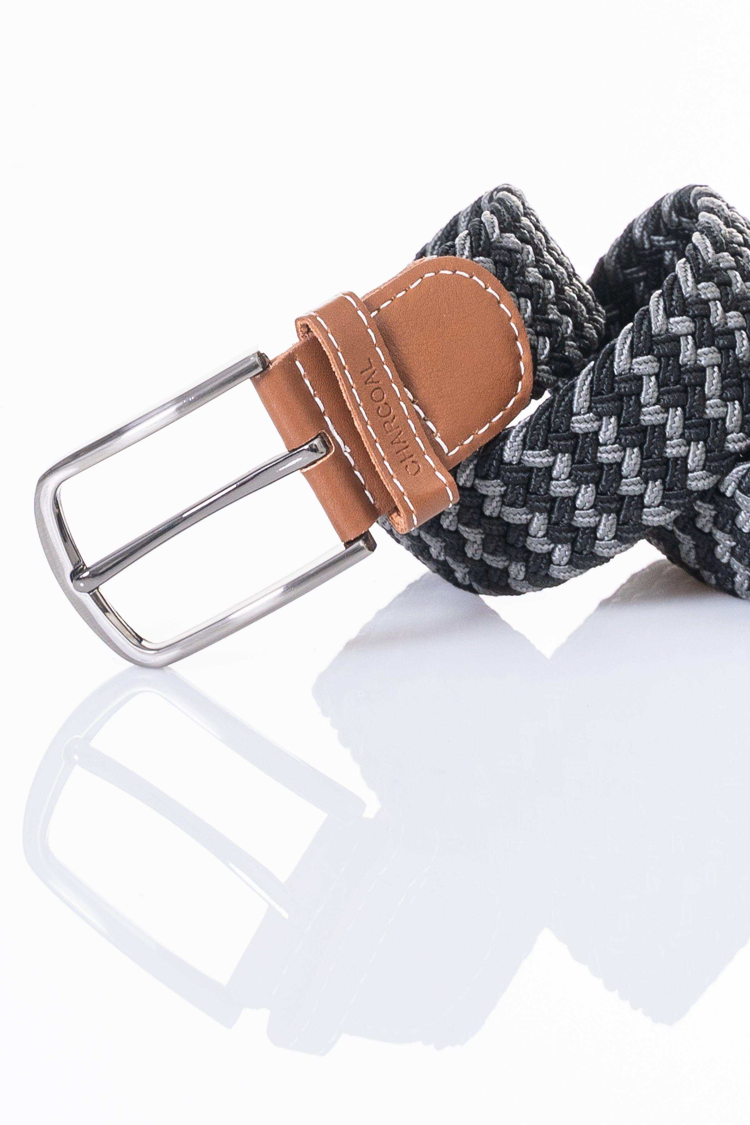 Woven belt with dark gray pattern and tan leather strap, silver buckle.