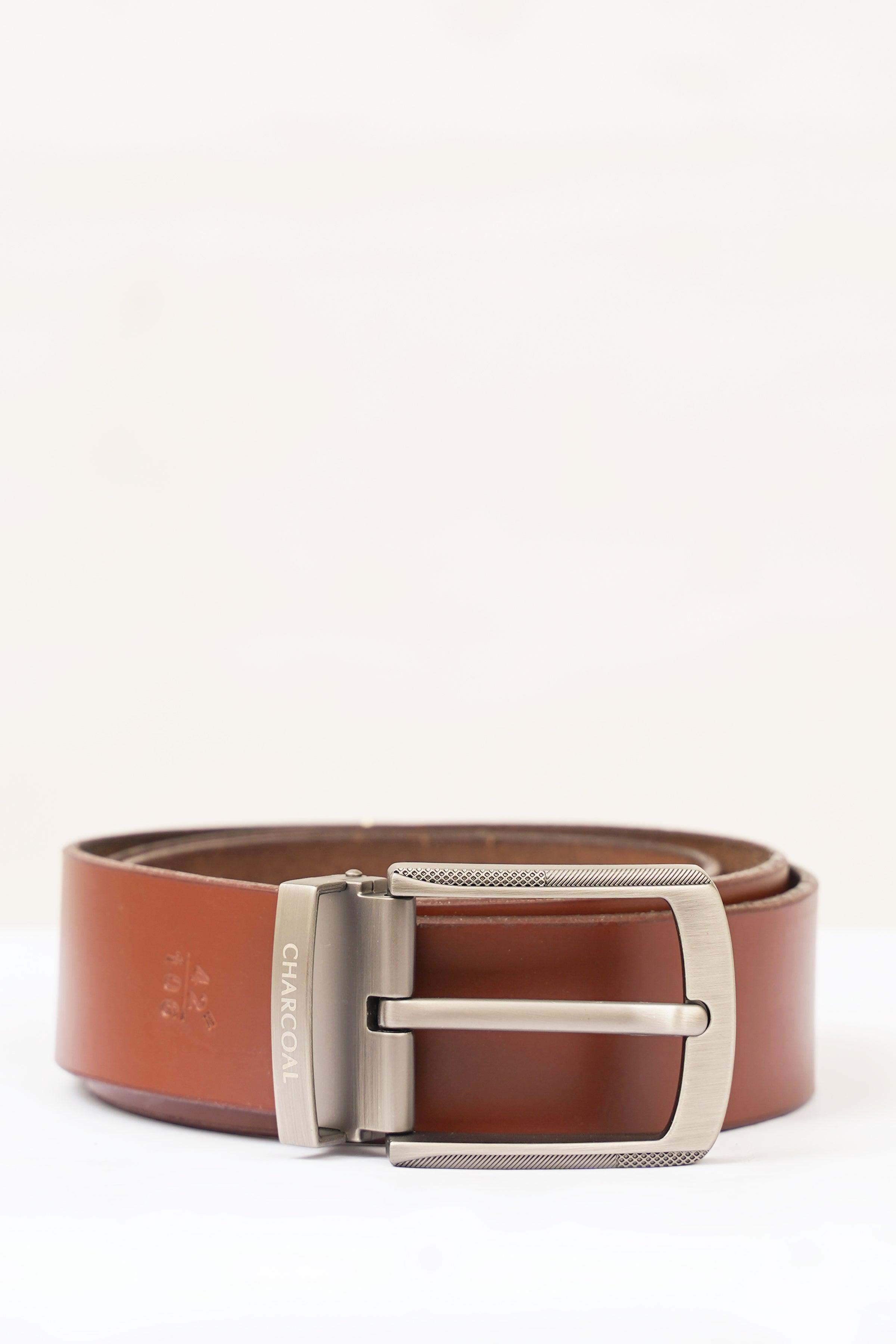 Brown leather belt with silver adjustable buckle and metal keeper, front view