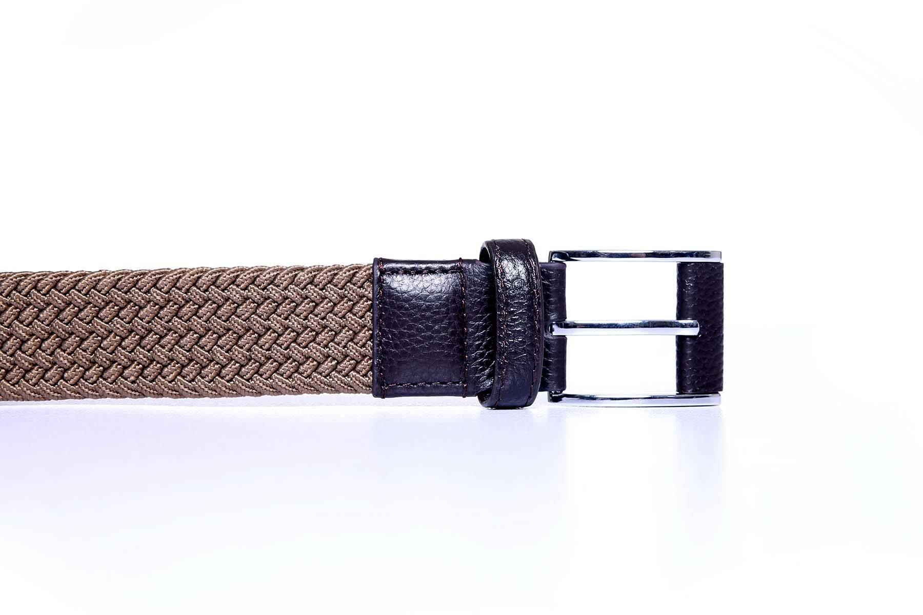 Casual belt close-up: woven strap with dark leather buckle and square frame