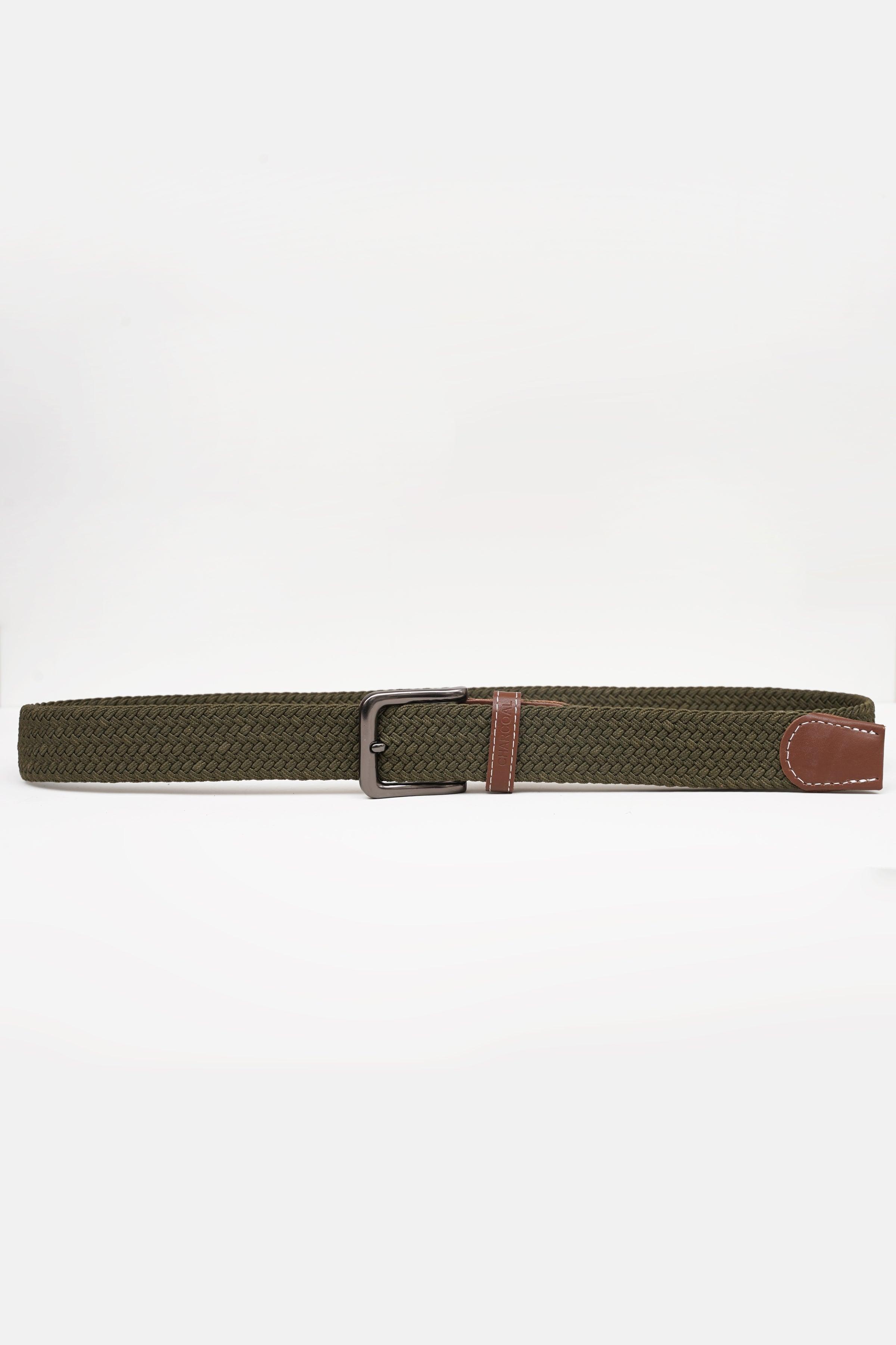 Olive woven belt with silver buckle and brown leather end tab with contrast stitching