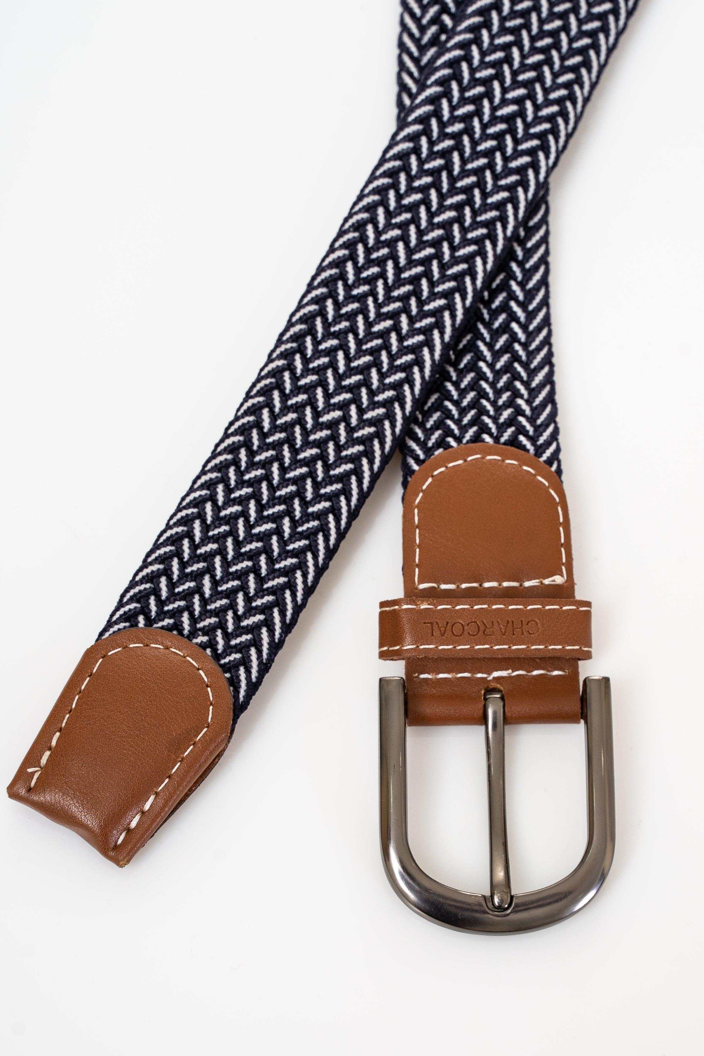 Braided navy belt detail with brown leather tabs and silver buckle