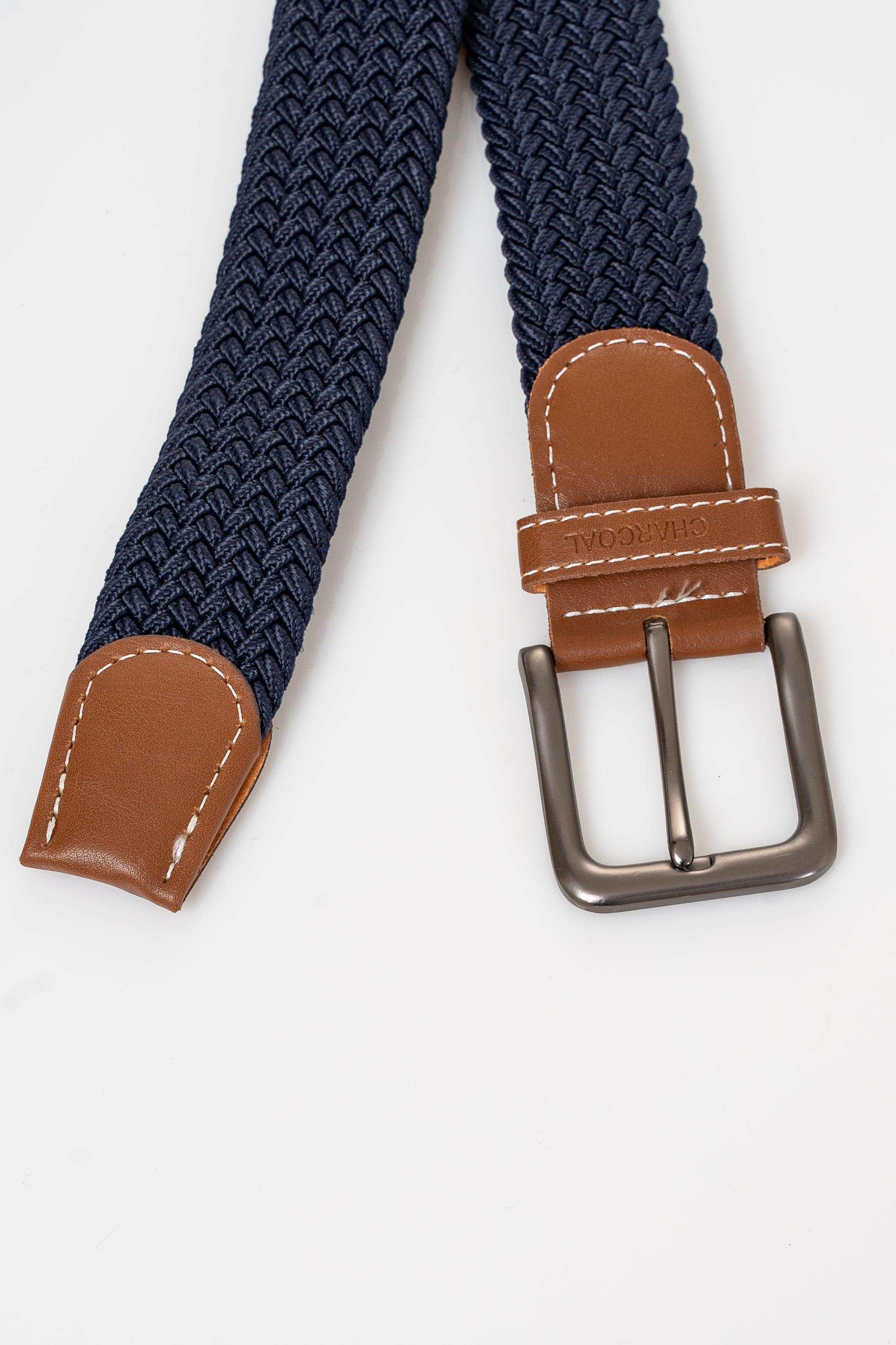 Navy woven belt with tan leather end caps and silver-tone metal buckle