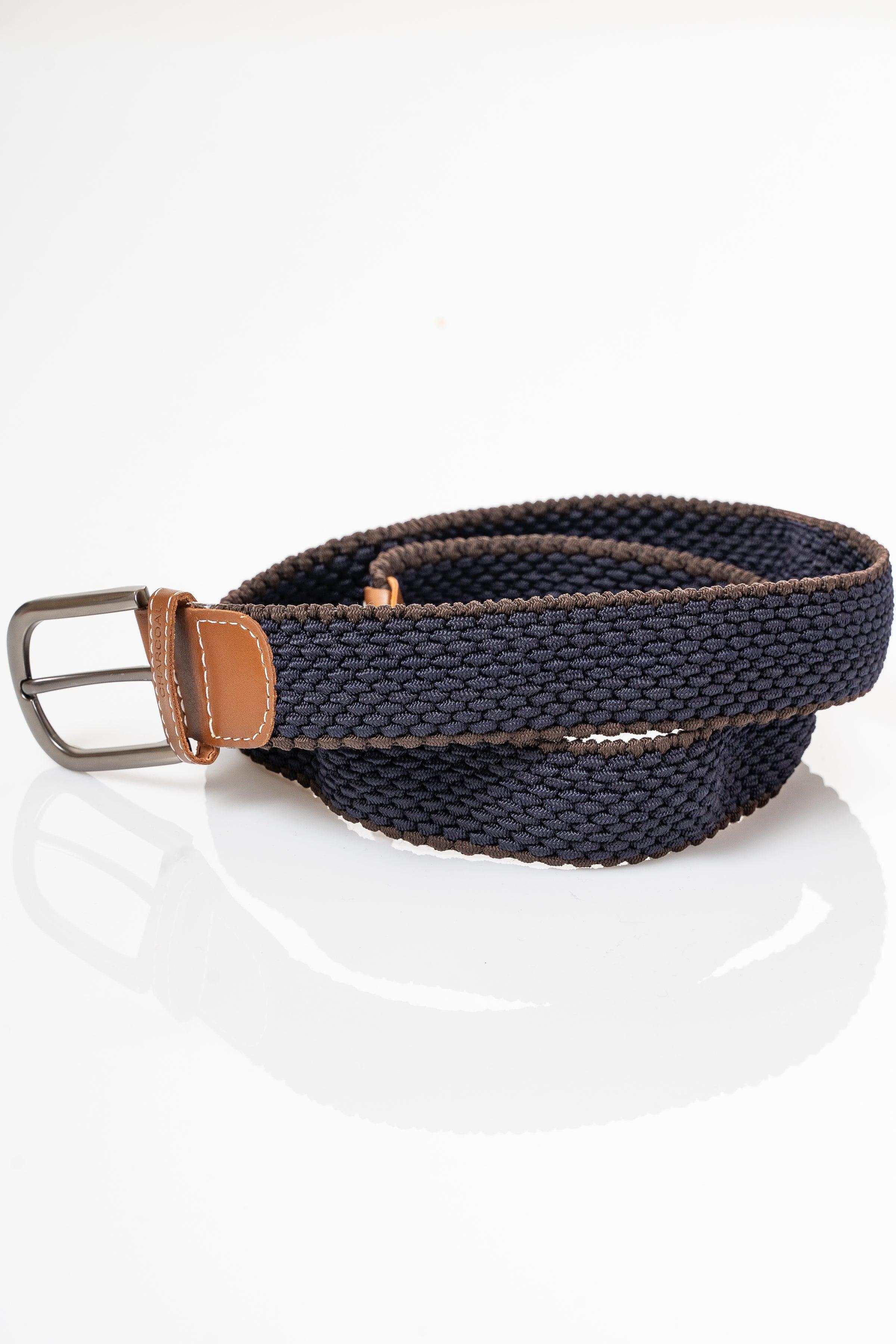 Dark navy woven belt with tan leather end tab and silver buckle