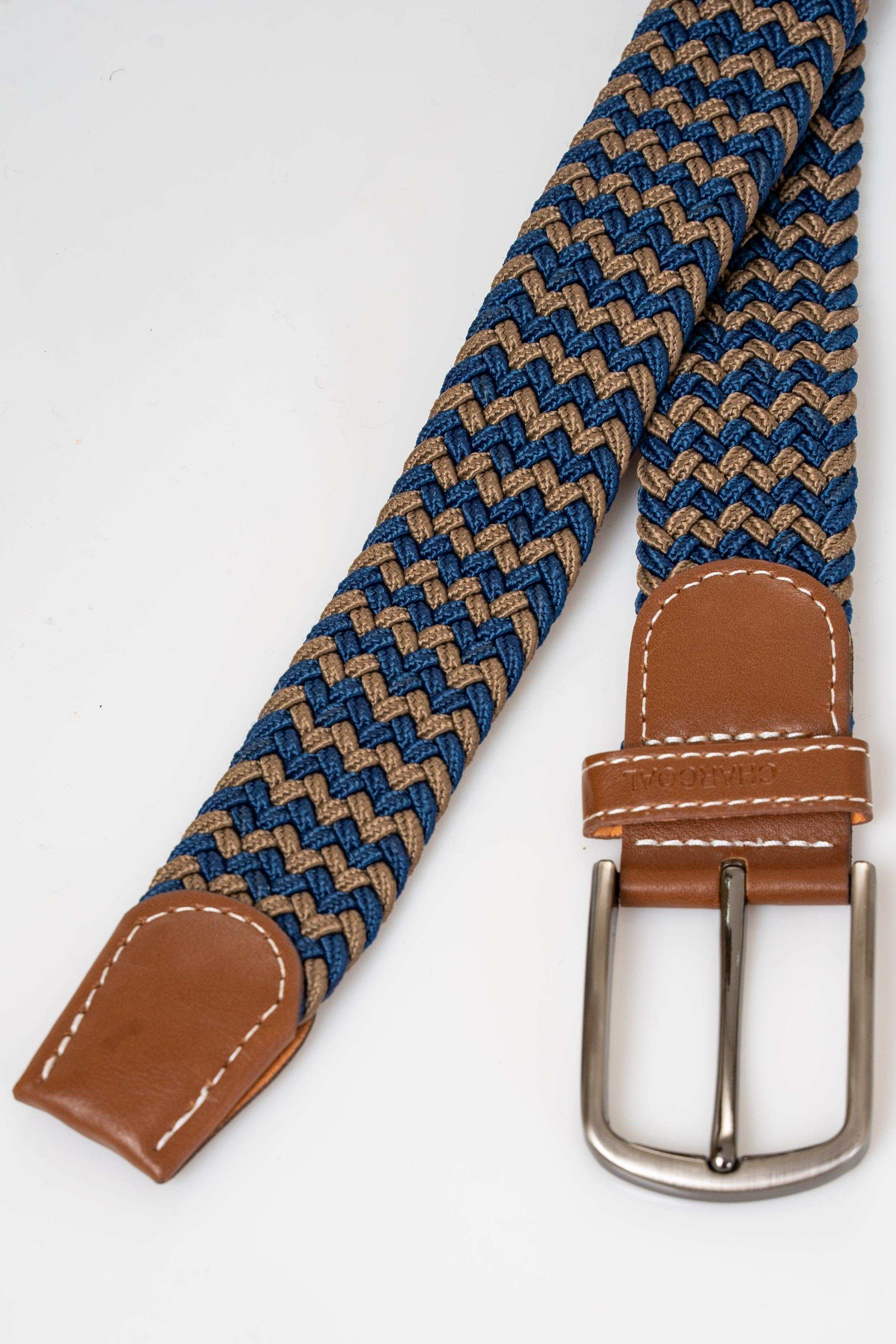 Woven belt end with tan leather keeper and silver buckle, blue braided pattern