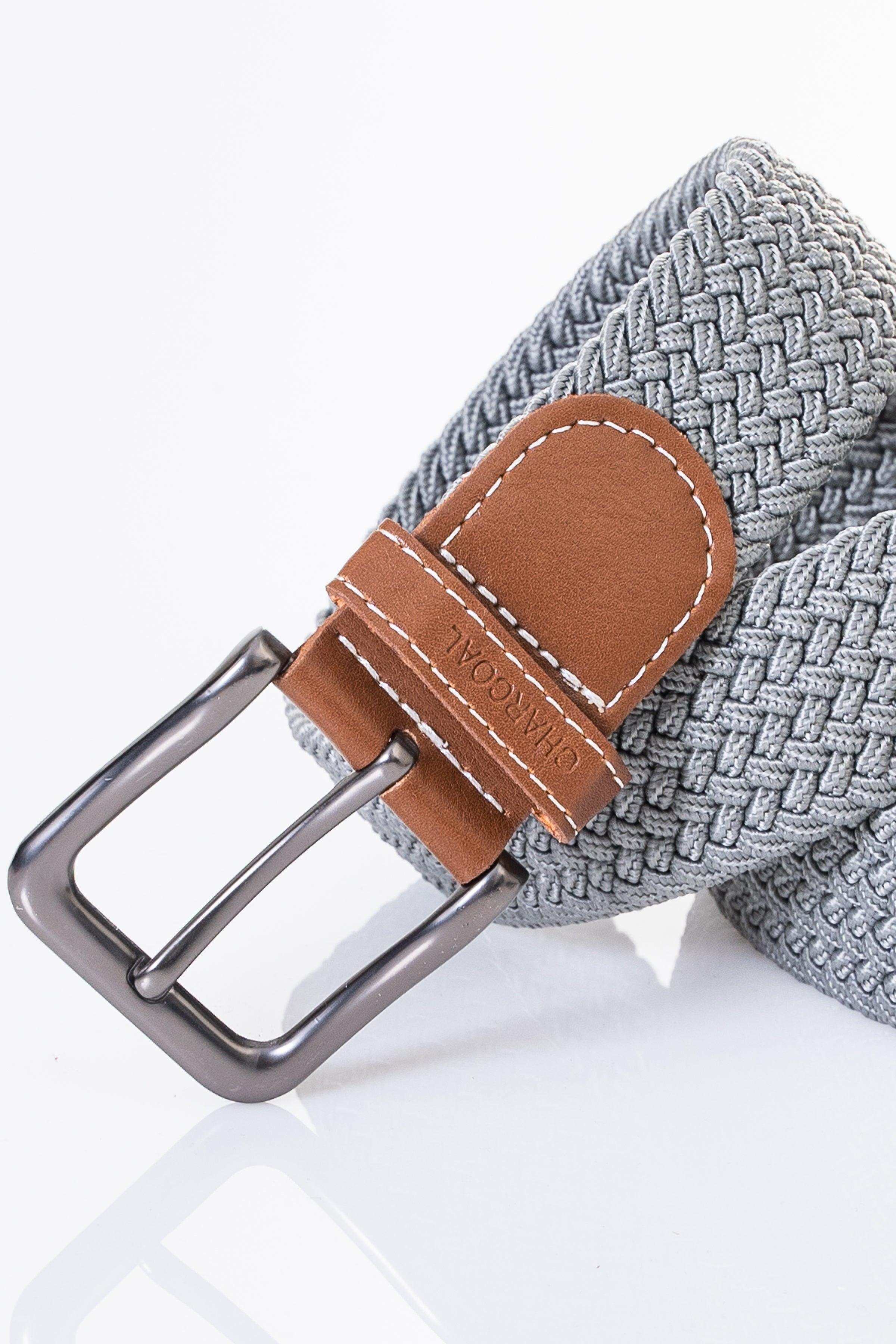 Woven casual belt with dark gray woven strap, brown leather end, and silver adjustable buckle.