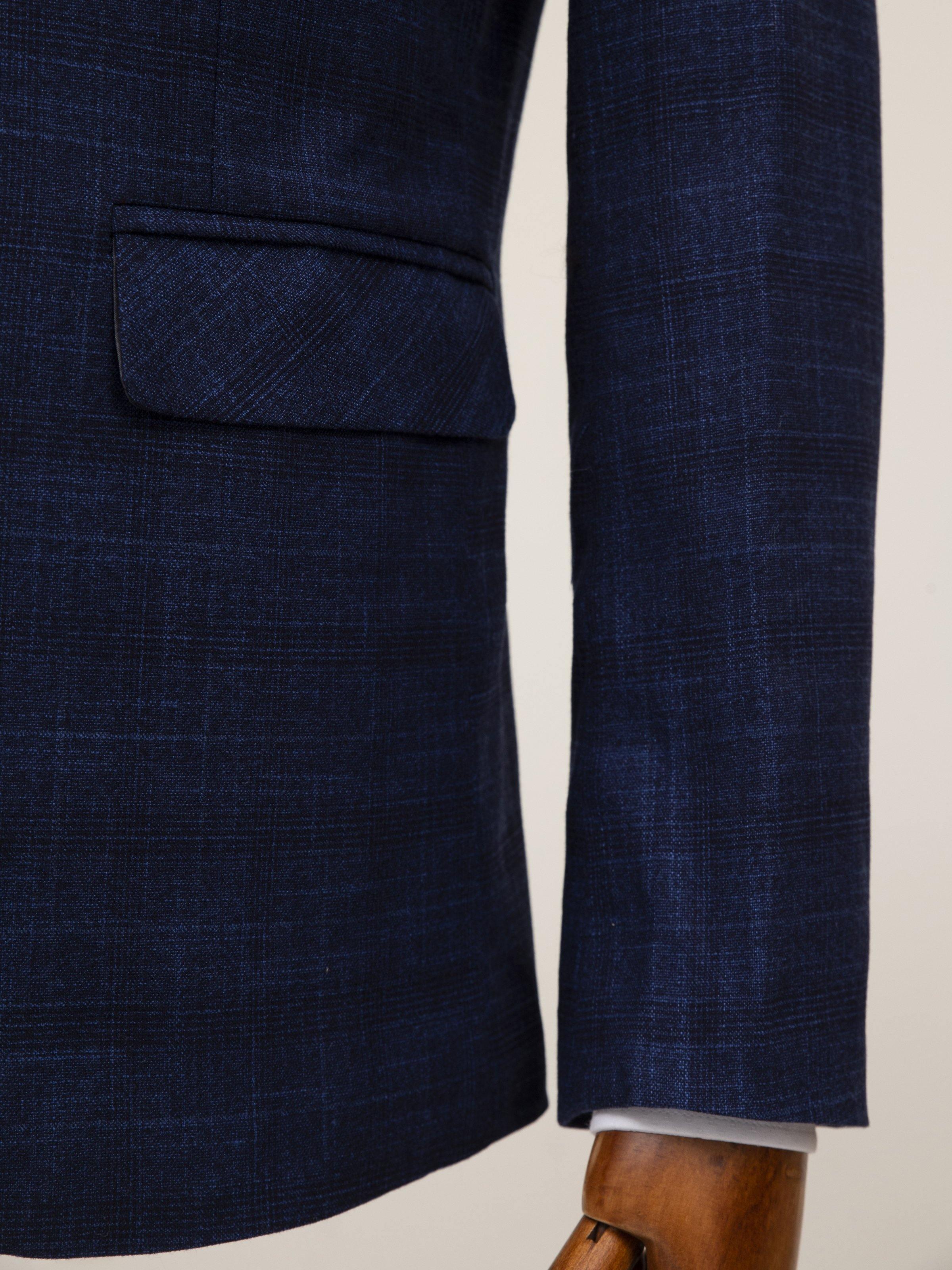Blue casual coat with side welt pocket detail and long sleeve cuff