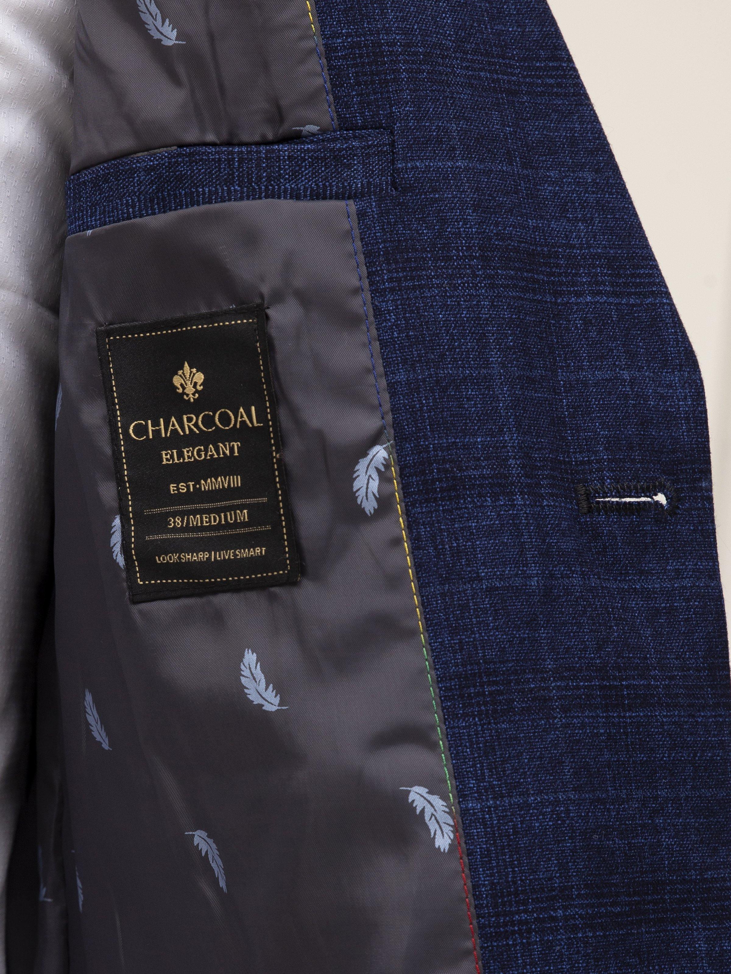 Blue coat lining with Charcoal Elegant label and leaf-pattern fabric