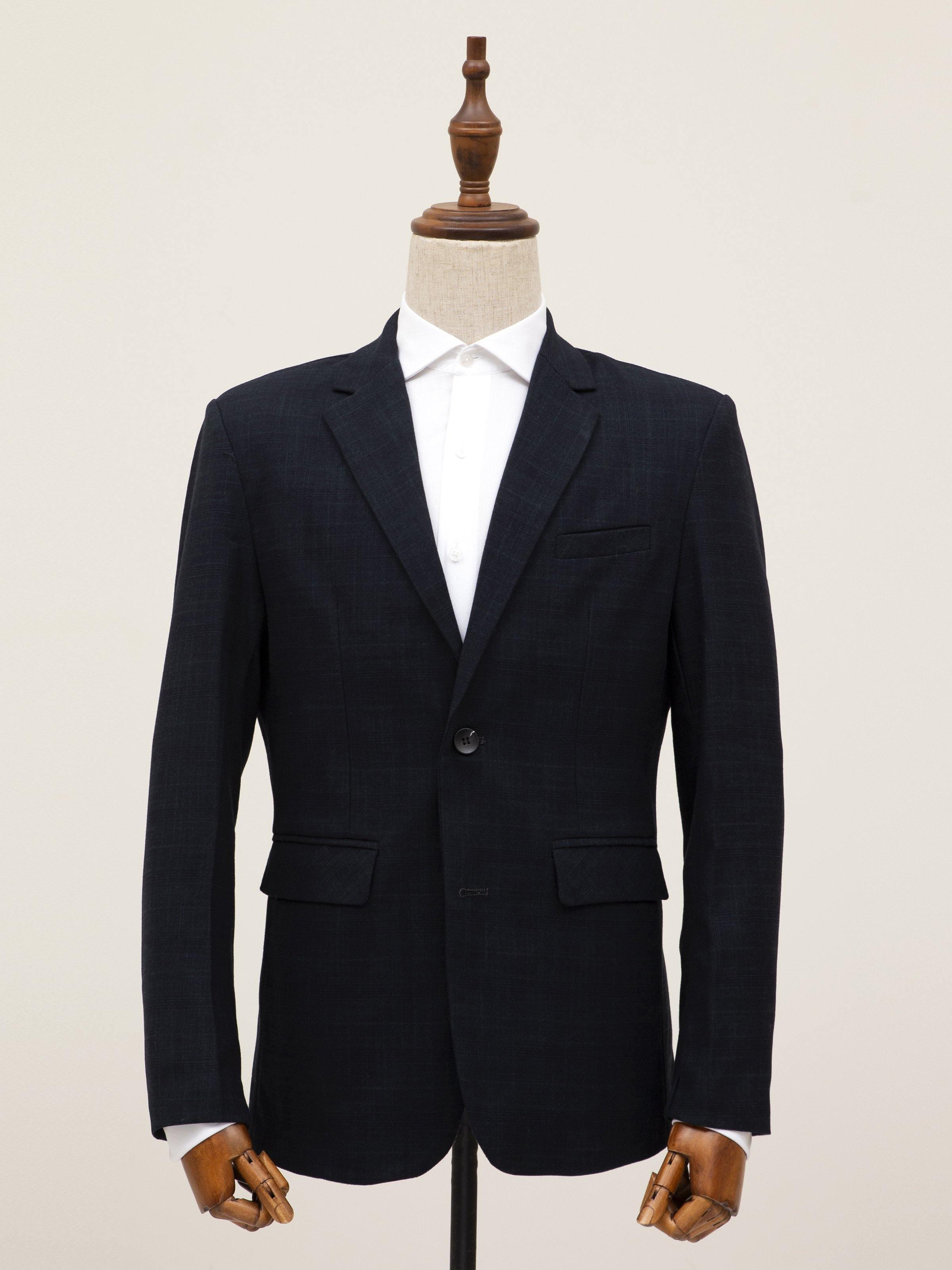 Dark casual coat with notch lapels, two-button front, and front welt pockets