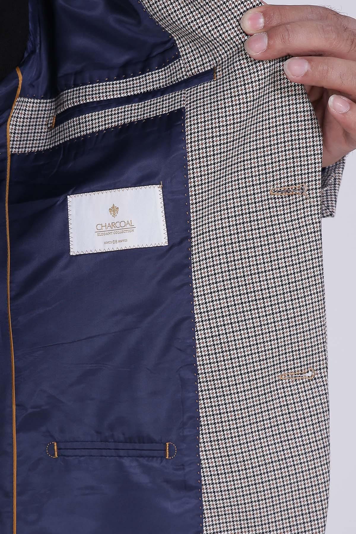 Tailored coat lining label and interior pocket opening, beige and navy blue