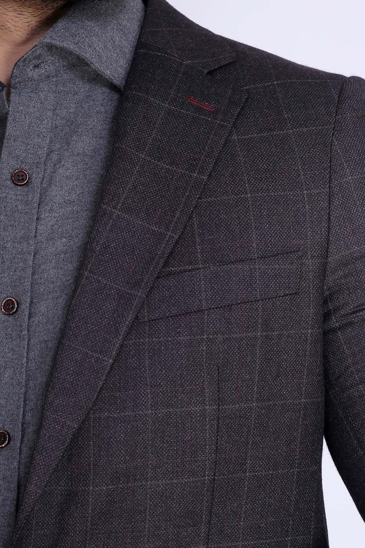 Charcoal coat shoulder and sleeve seam with check pattern and welt pockets