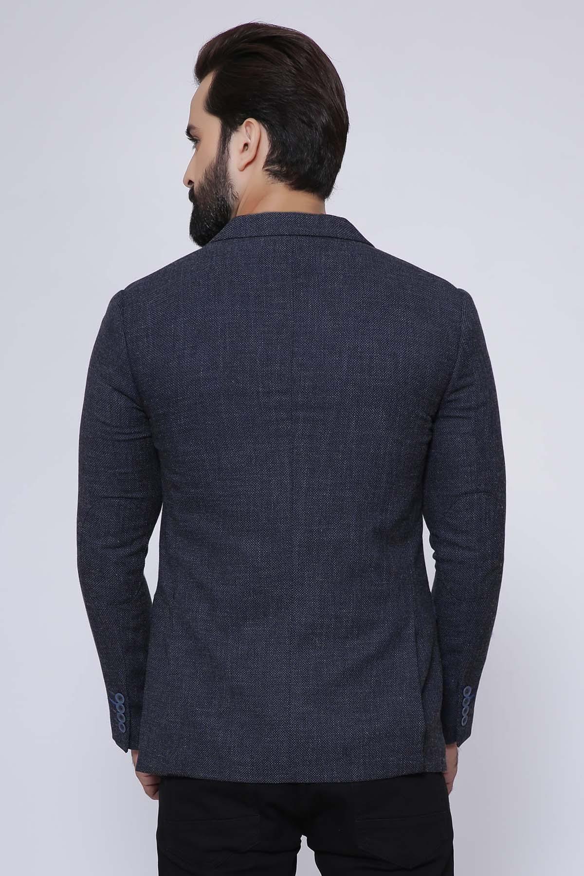 Slim-fit navy coat back view with two-button cuff details