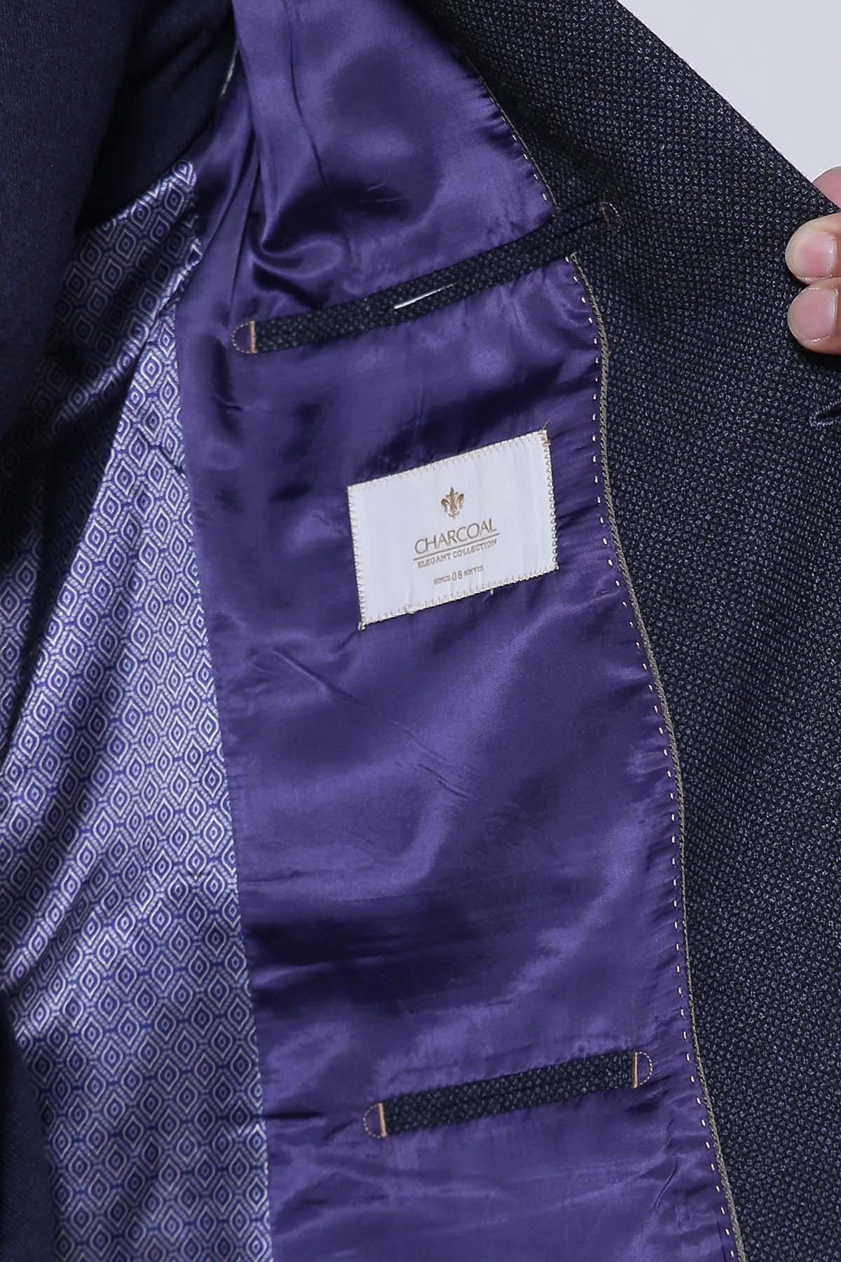 Navy coat interior lining with brand label and welt pocket
