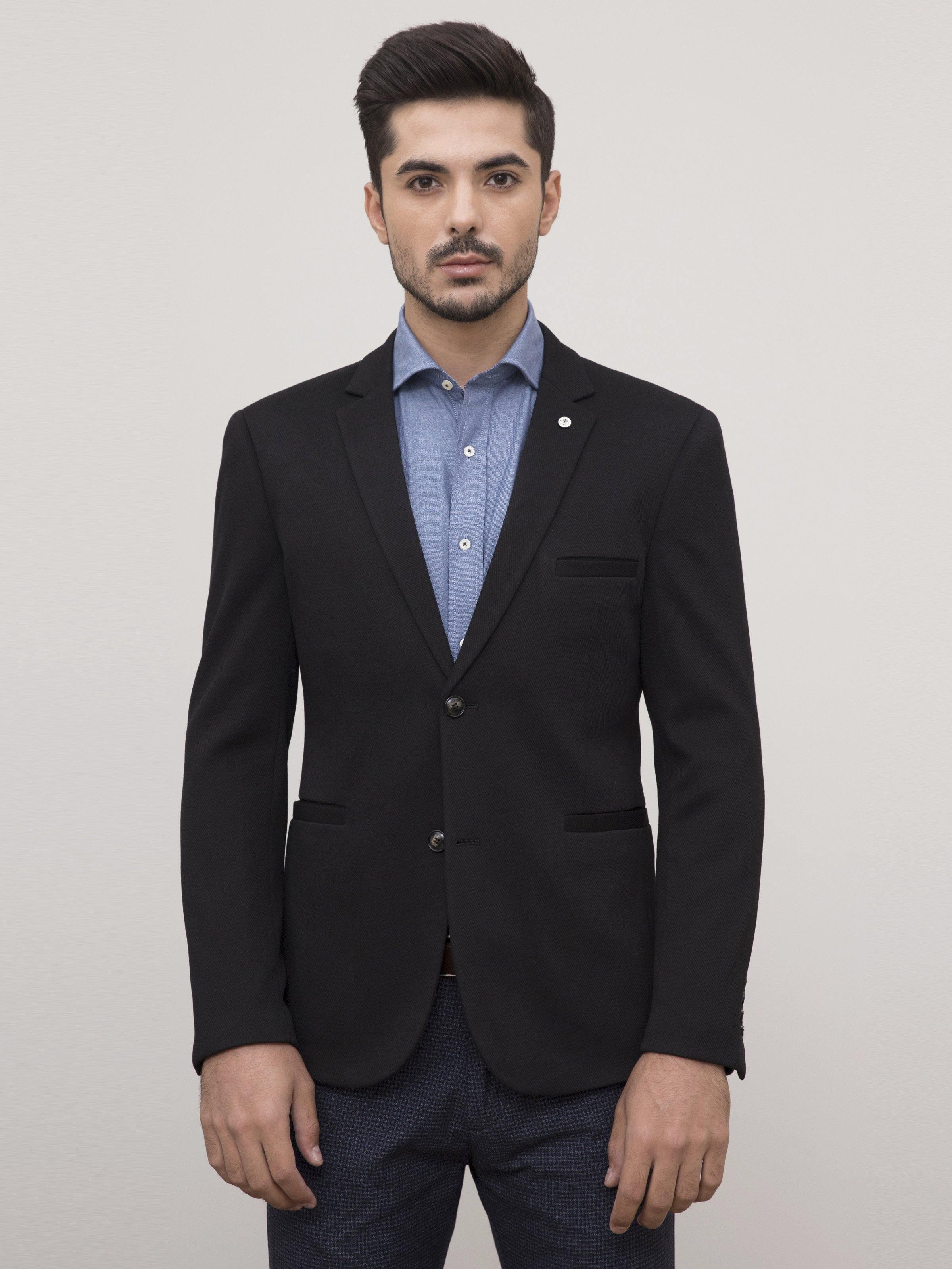 Black tailored coat with two flap pockets, button front, and notch lapels