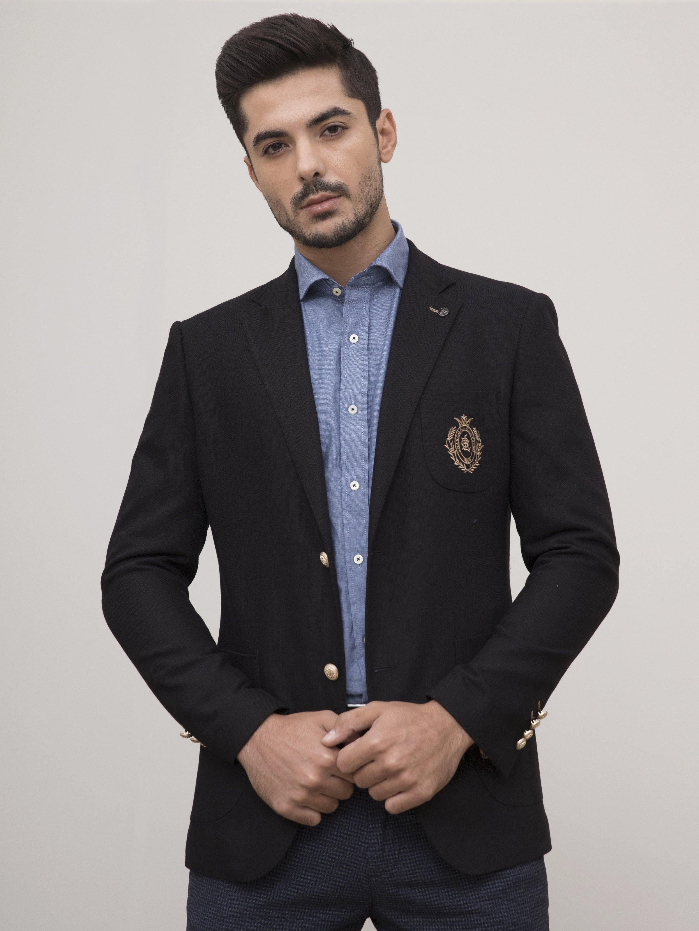 Black slim-fit casual coat with gold buttons and crest badge on pocket.
