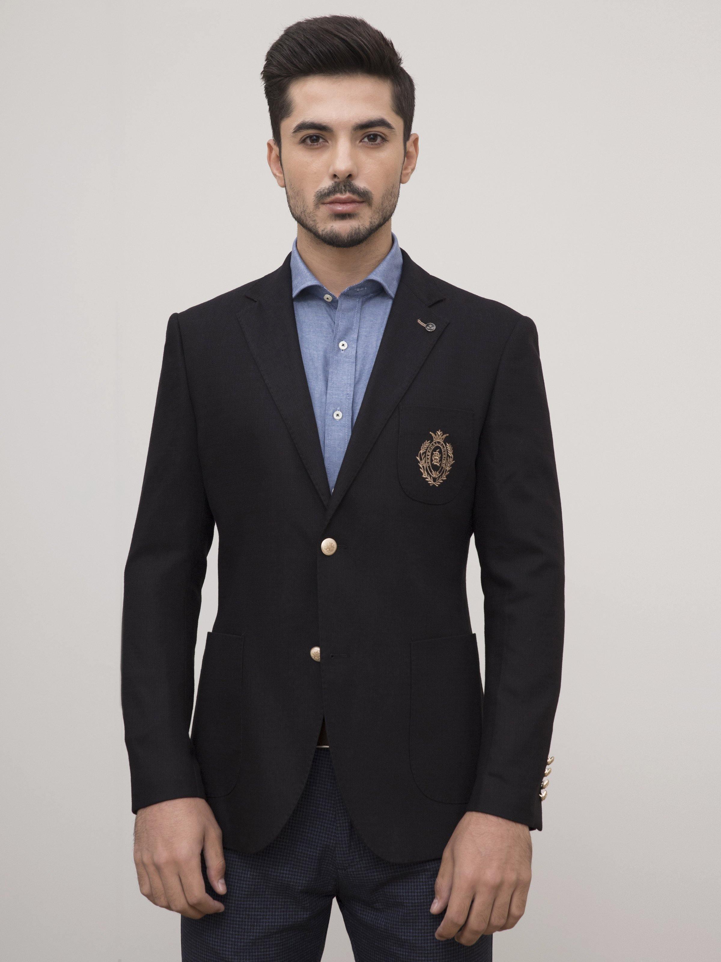 Black slim-fit casual coat, chest crest patch and front button closure.