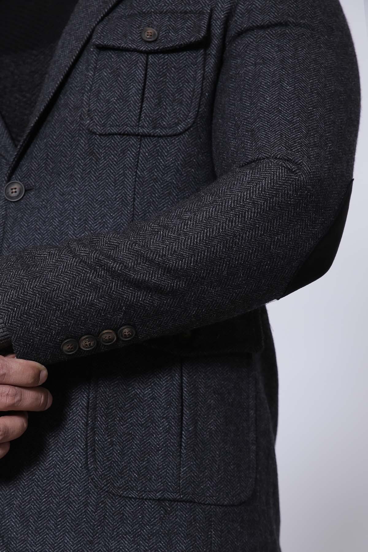 Charcoal slim-fit coat sleeve with cuff buttons and flap pockets