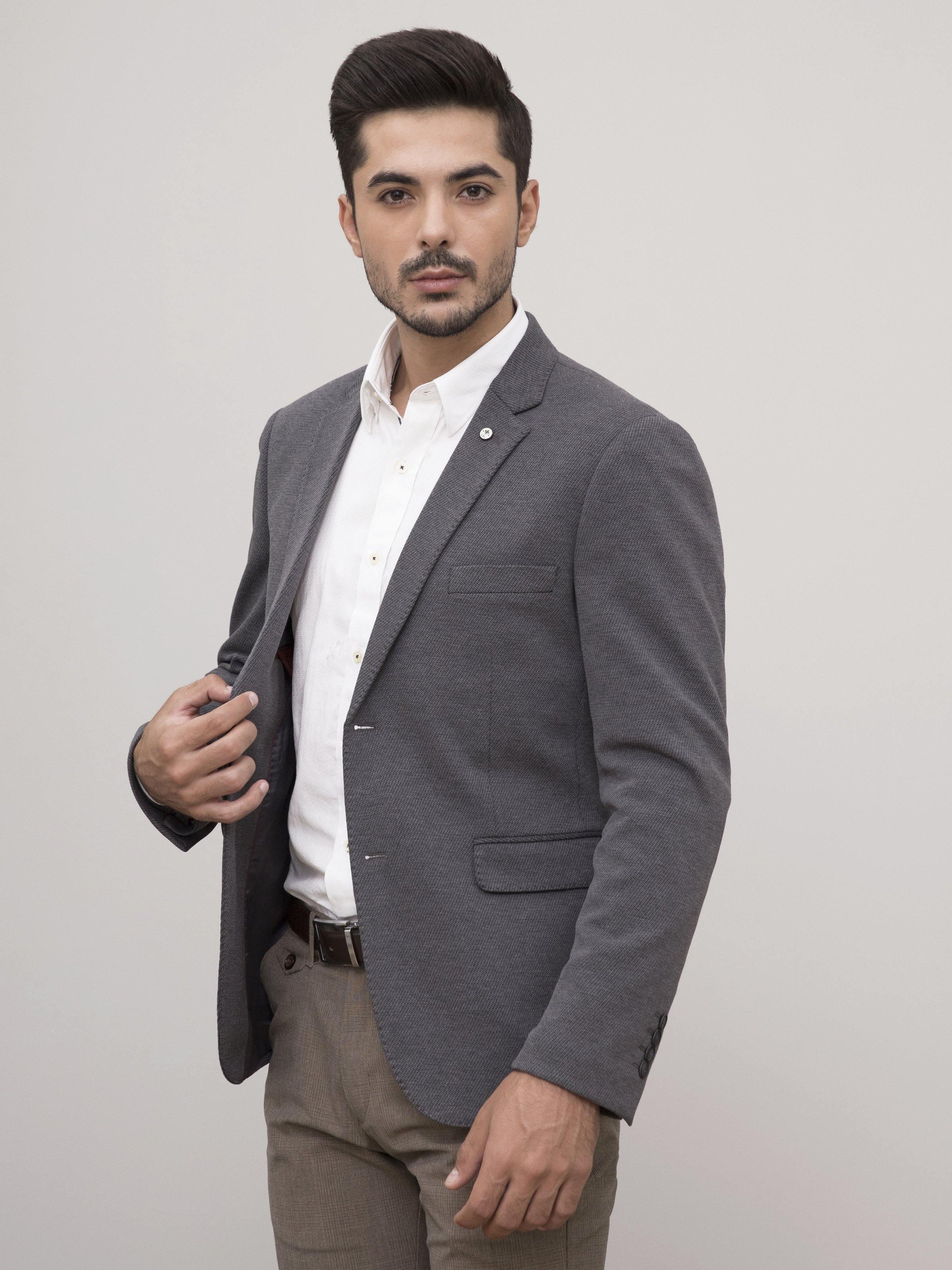 Slim-fit grey casual coat with notch lapel and front pockets, worn open over shirt