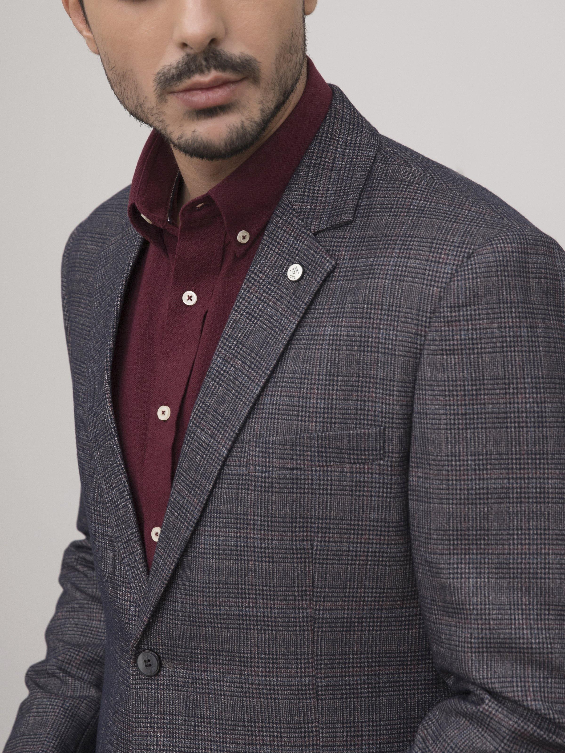 Blue-grey casual coat close-up with textured fabric, notch lapel, chest pocket