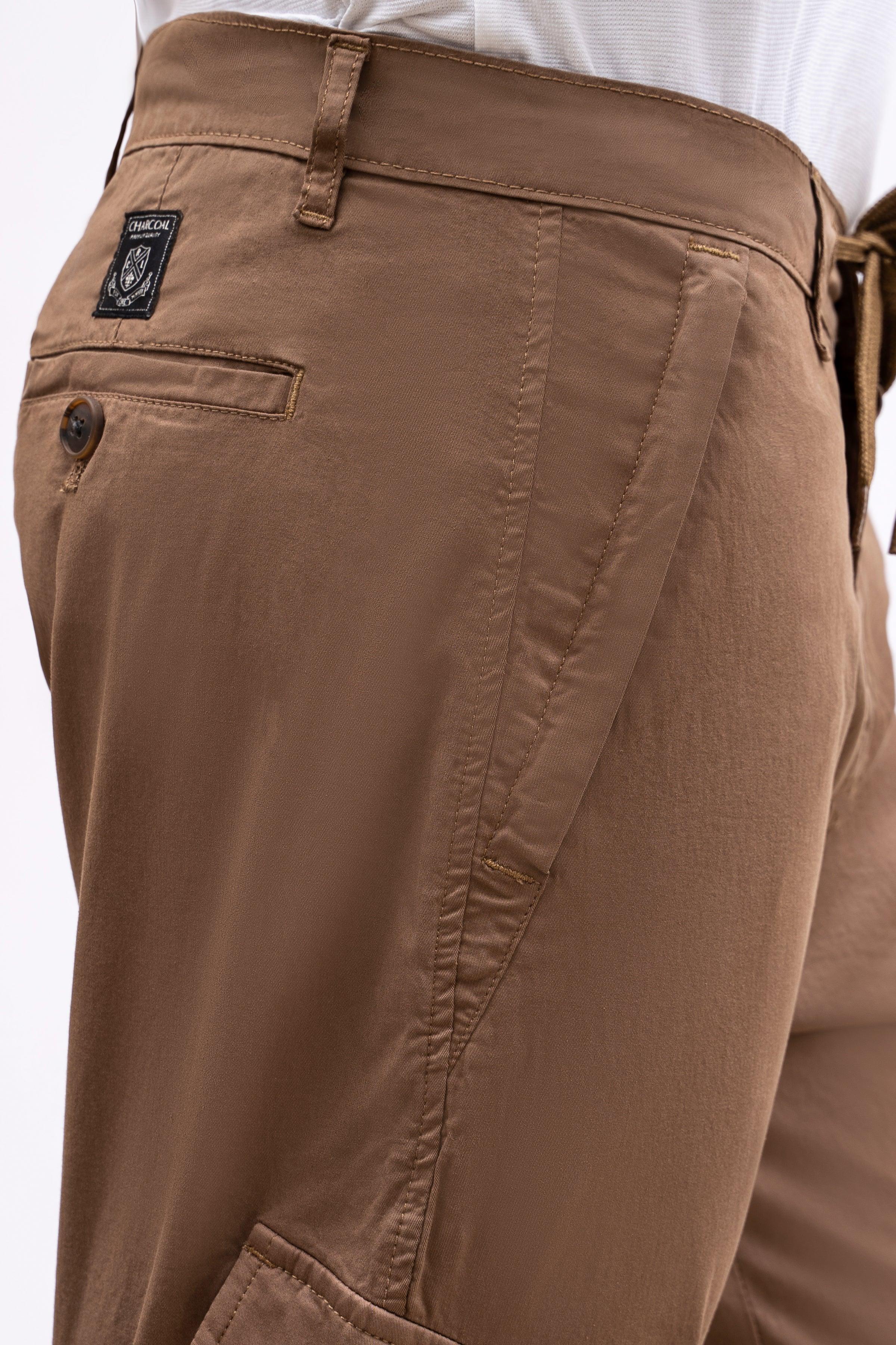 Dark khaki jogger trousers with belt loops and logo patch on waistband
