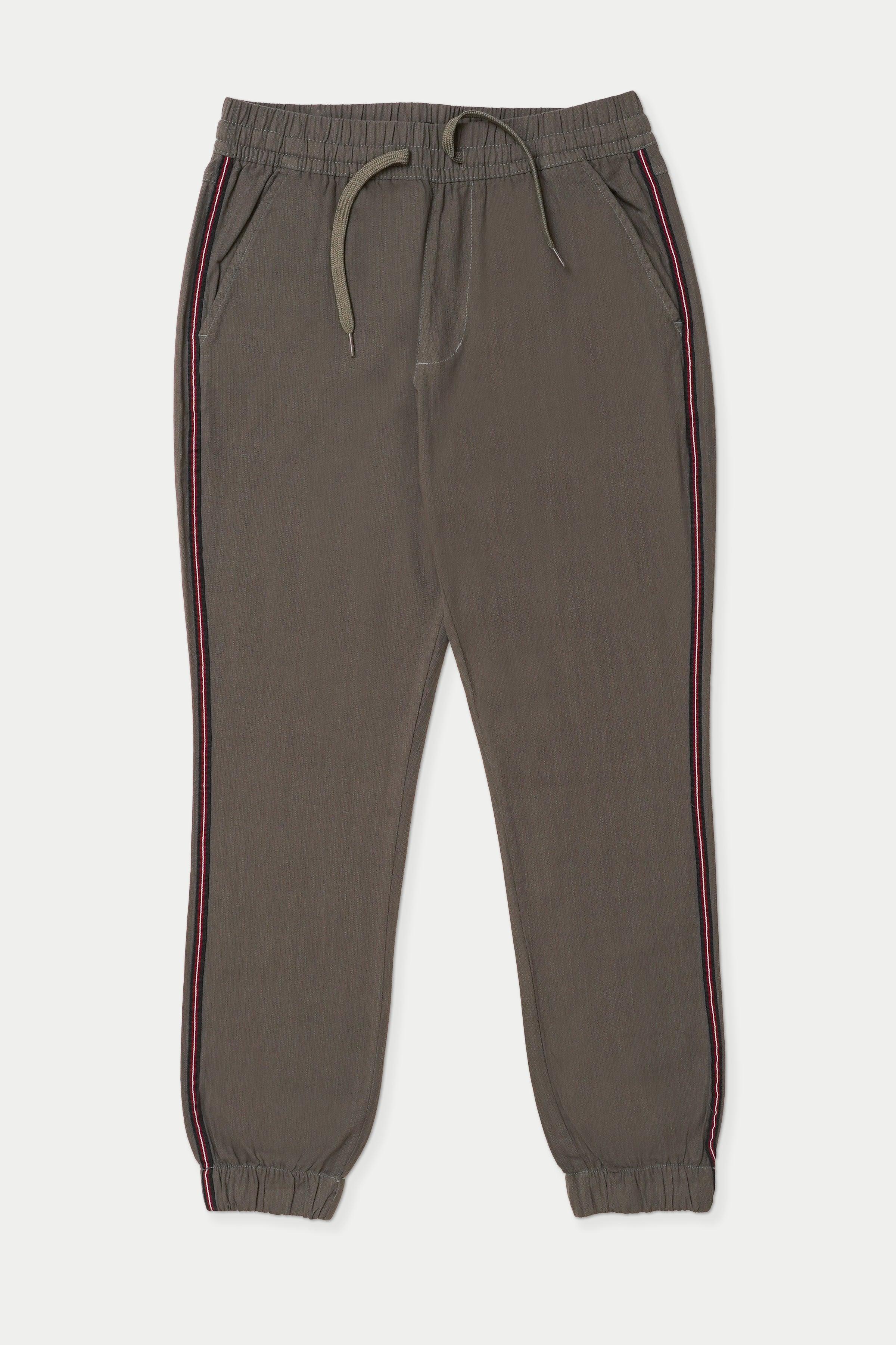 Grey casual jogger trousers with drawstring waist and side stripe, tapered legs