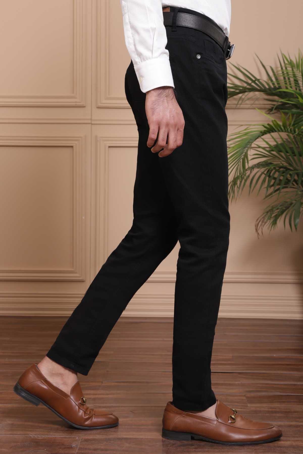 Black 5-pocket casual pants shown from side angle with fitted straight legs