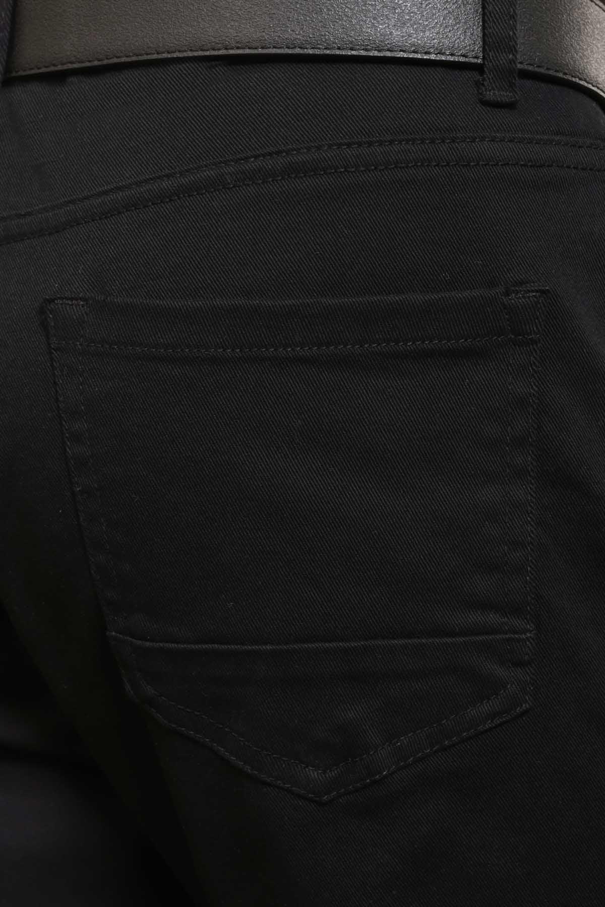 Black casual pants front pocket detail with visible stitching and pocket opening