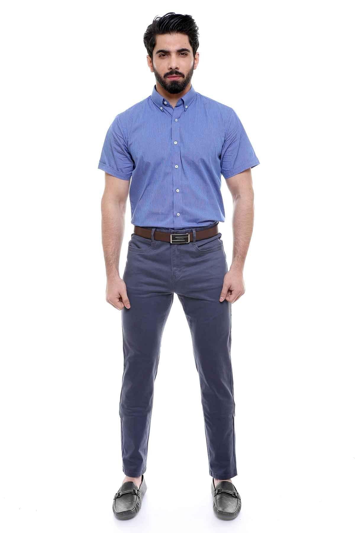 Light blue slim-fit casual pants with five pockets, belt loops, and zip fly